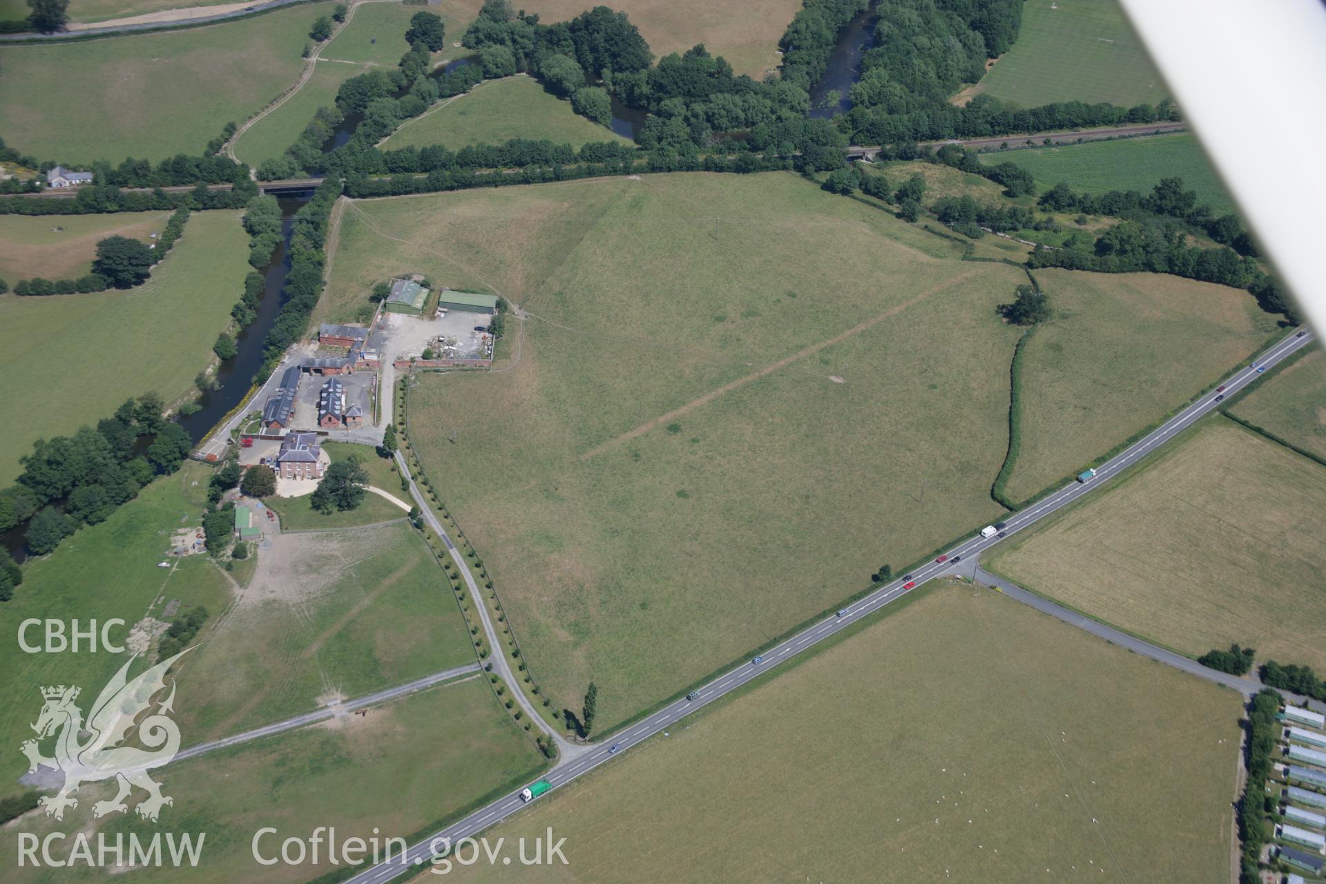 RCAHMW colour oblique aerial photograph of a Roman Road at Glanhafren. Taken on 17 July 2006 by Toby Driver.