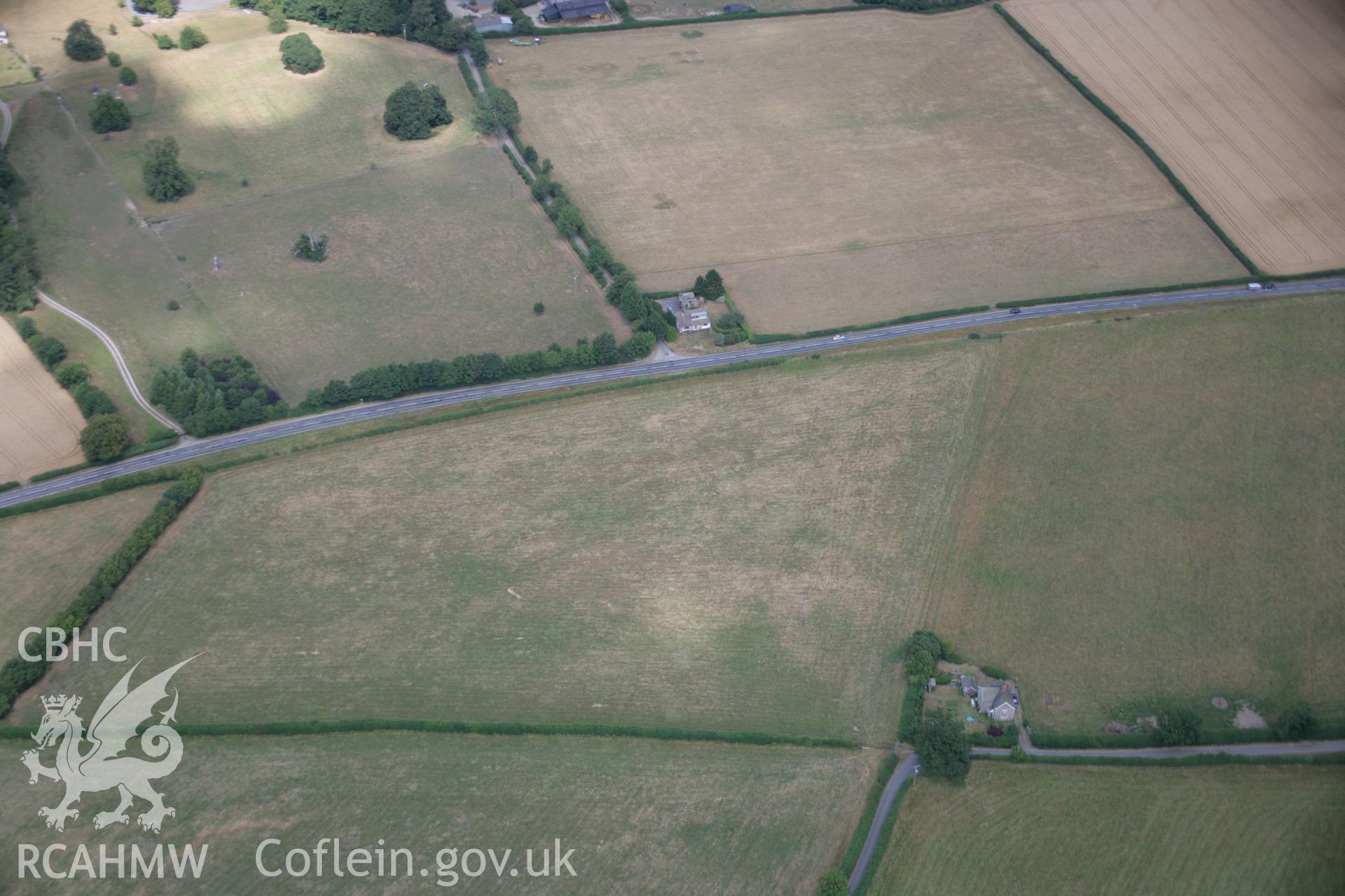 RCAHMW colour oblique aerial photograph of parallel ditches at Garden House, possibly representing a cursus monument. Taken on 27 July 2006 by Toby Driver.