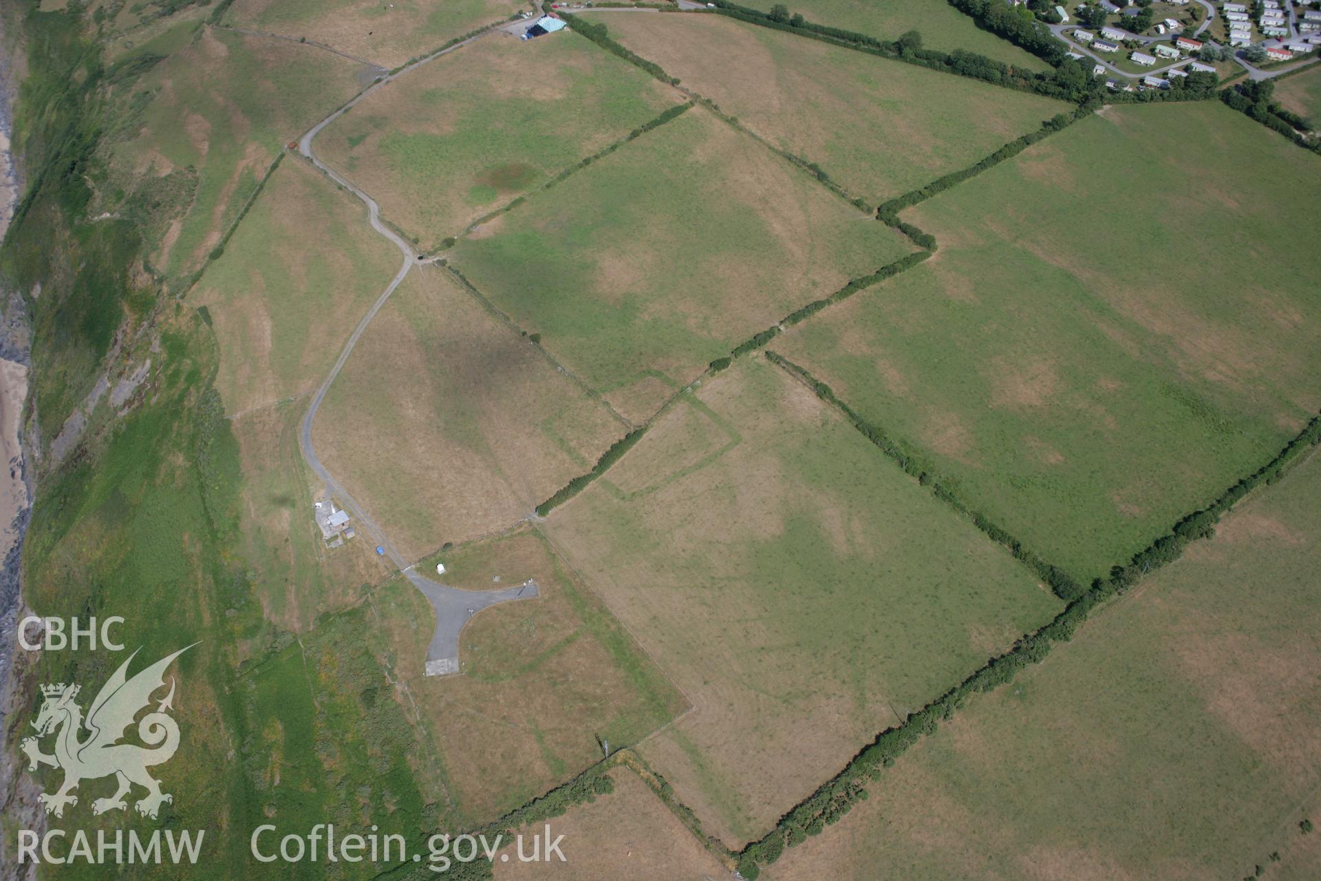 RCAHMW colour oblique aerial photograph of Ty-Hen Defended Enclosure. Taken on 27 July 2006 by Toby Driver.