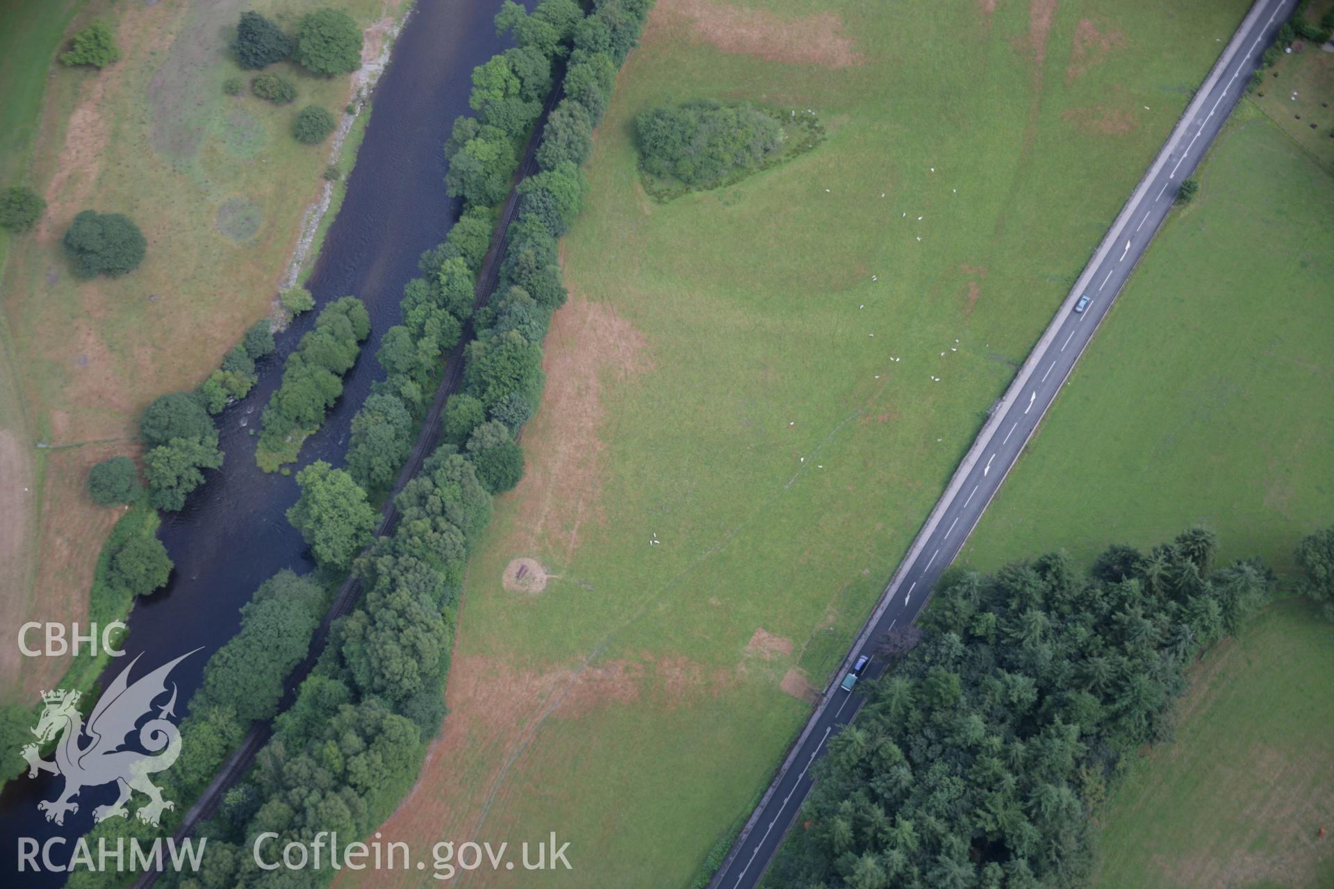 RCAHMW colour oblique aerial photograph of Owen Glyndwr's House Moat. Taken on 31 July 2006 by Toby Driver.