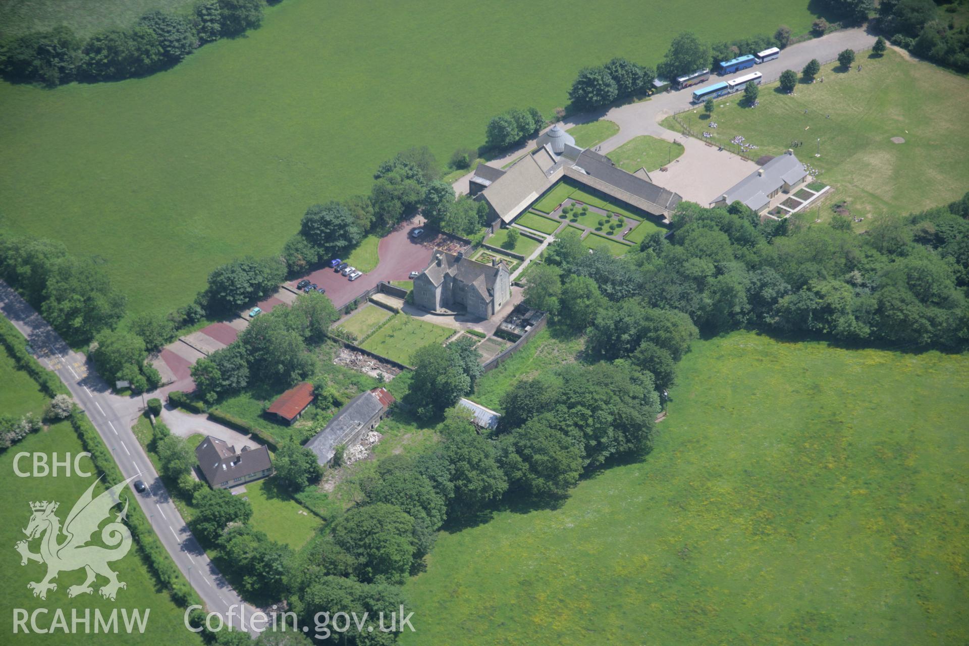 RCAHMW colour oblique aerial photograph of Llancaiach Fawr house, viewed from the north-west. Taken on 09 June 2006 by Toby Driver.