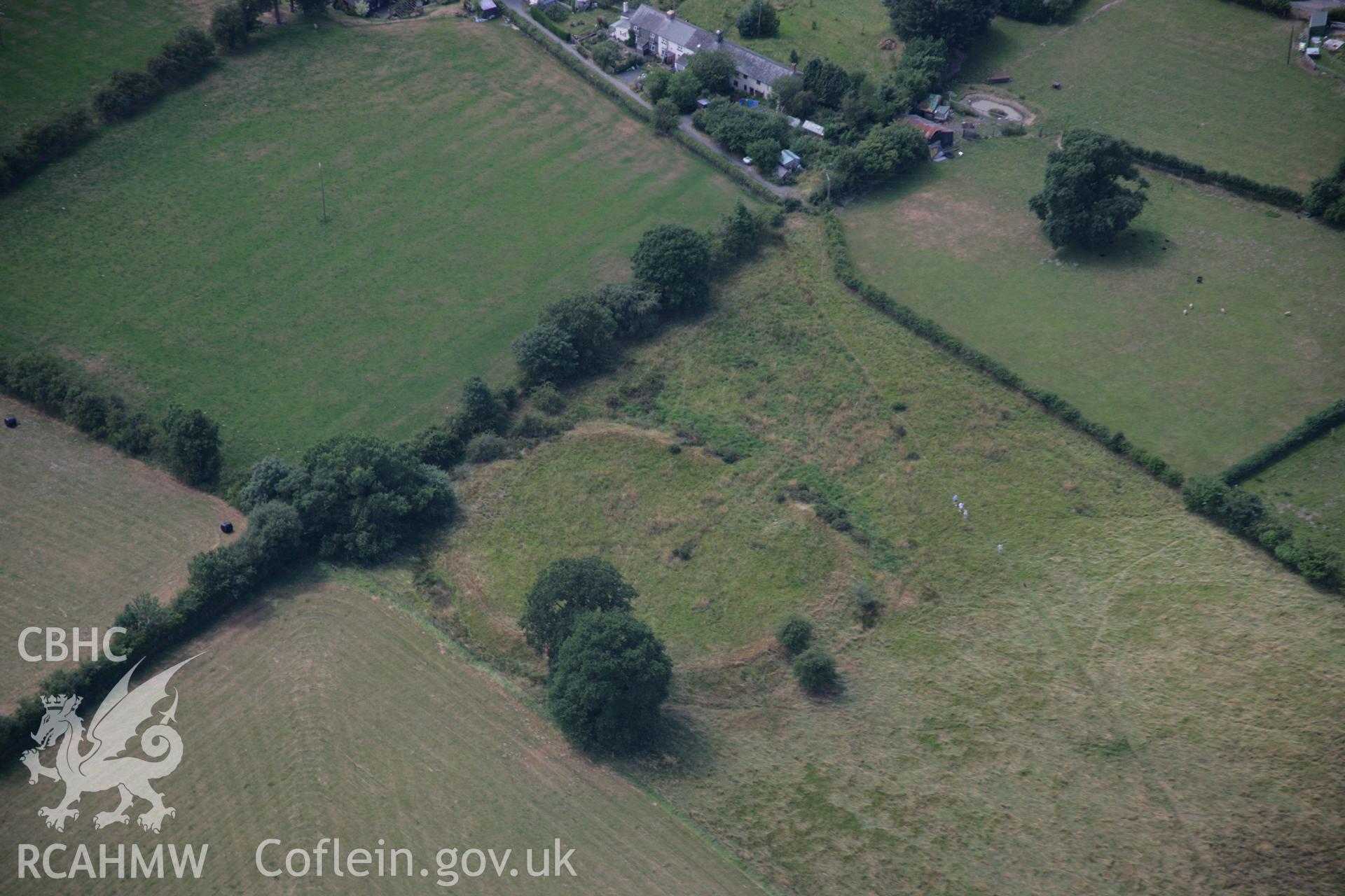 RCAHMW colour oblique aerial photograph of Caer Du Defended Enclosure. Taken on 27 July 2006 by Toby Driver.