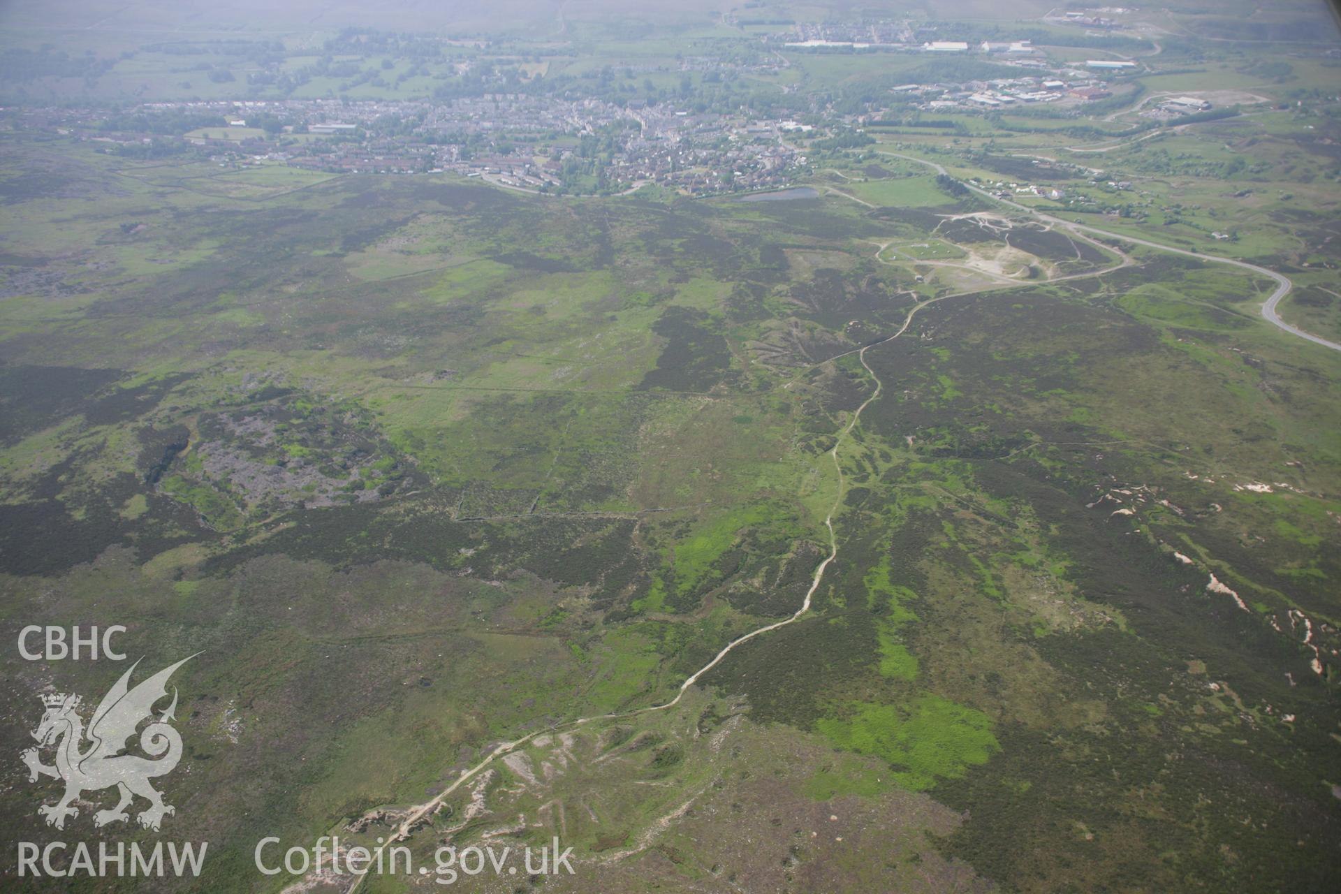 RCAHMW colour oblique aerial photograph of Nant Llechan Ironstone Workings, viewed from the north-east. Taken on 09 June 2006 by Toby Driver.