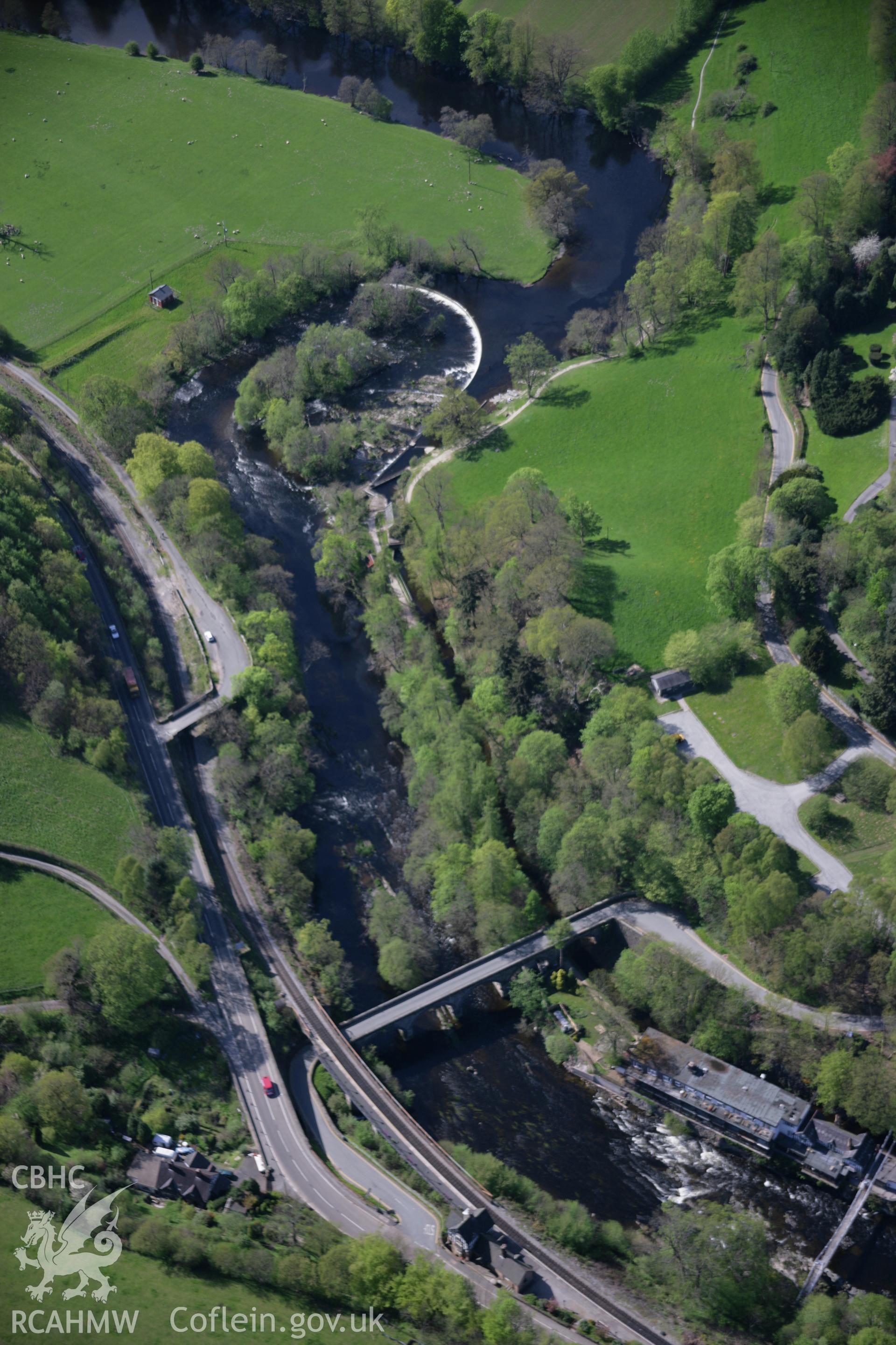 RCAHMW digital colour oblique photograph of Horseshoe Falls and the canal viewed from the south-east. Taken on 05/05/2006 by T.G. Driver.