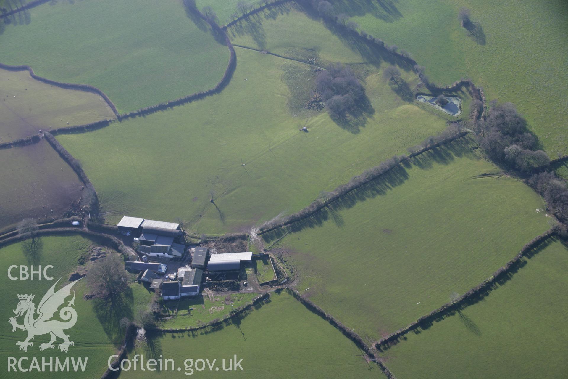 RCAHMW colour oblique aerial photograph of Meinillwydion Standing Stone Pair and field earthworks, Llandyfaelog, Pentre, viewed from the north-west. Taken on 26 January 2006 by Toby Driver