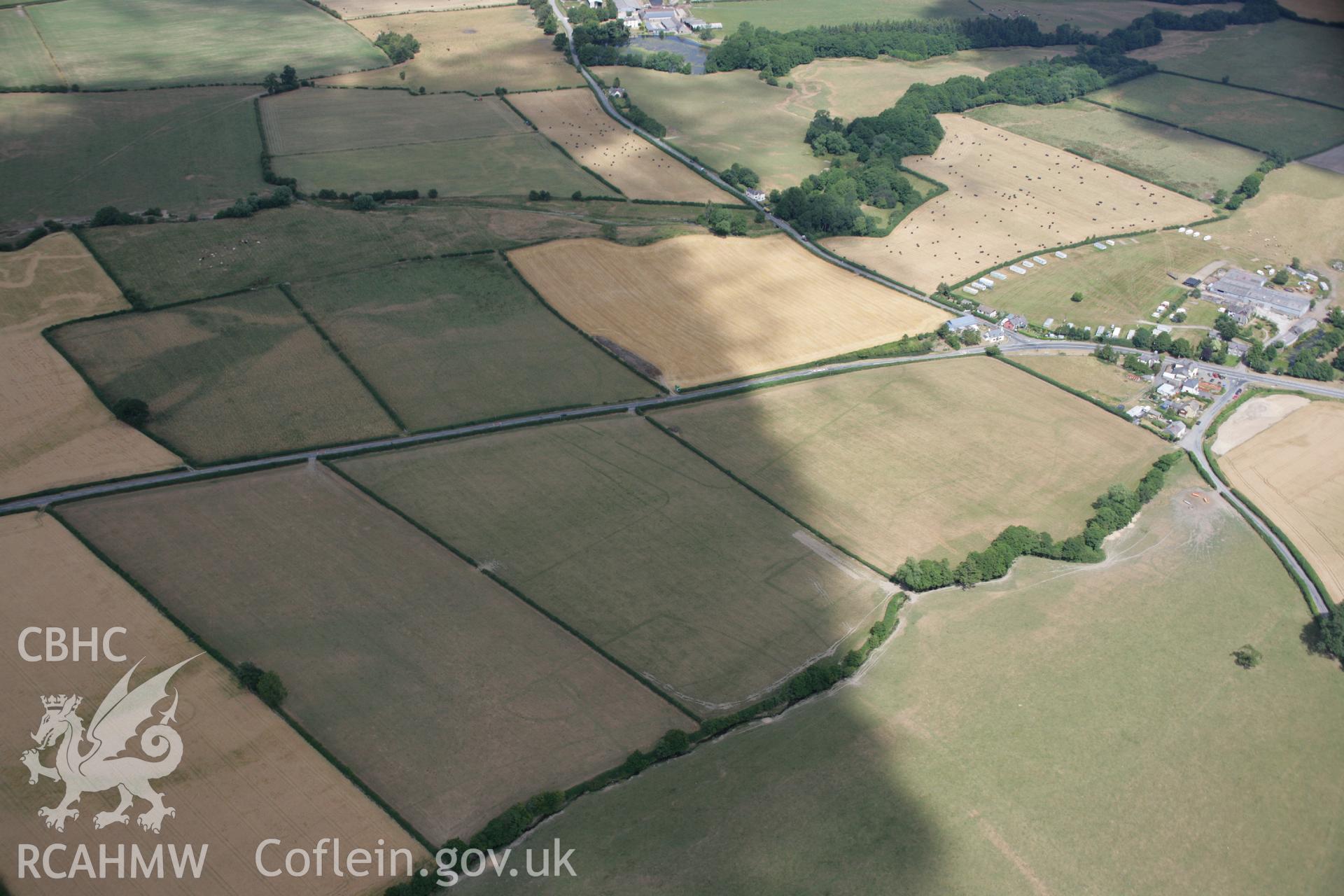 RCAHMW colour oblique aerial photograph of Walton Roman Camps II and III. Taken on 27 July 2006 by Toby Driver