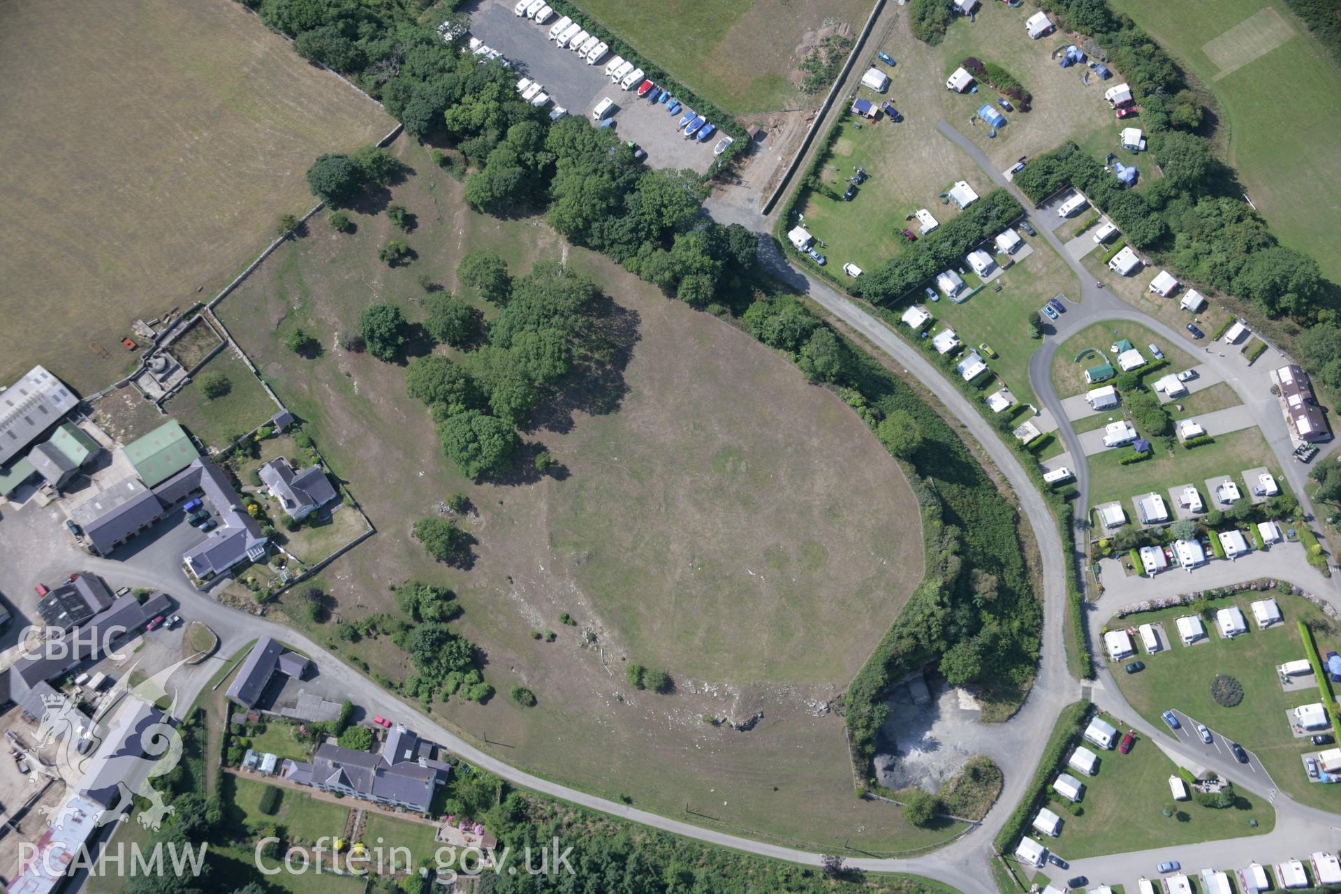 RCAHMW colour oblique aerial photograph of the possible site of a Roman Building in Parciau Hillfort. Taken on 14 August 2006 by Toby Driver.