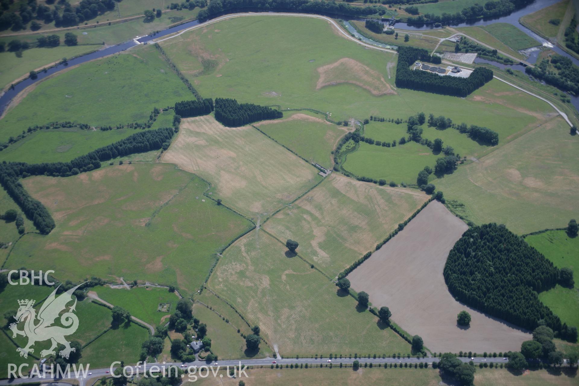 RCAHMW colour oblique aerial photograph of Llanfor Roman Fort. Taken on 25 July 2006 by Toby Driver.