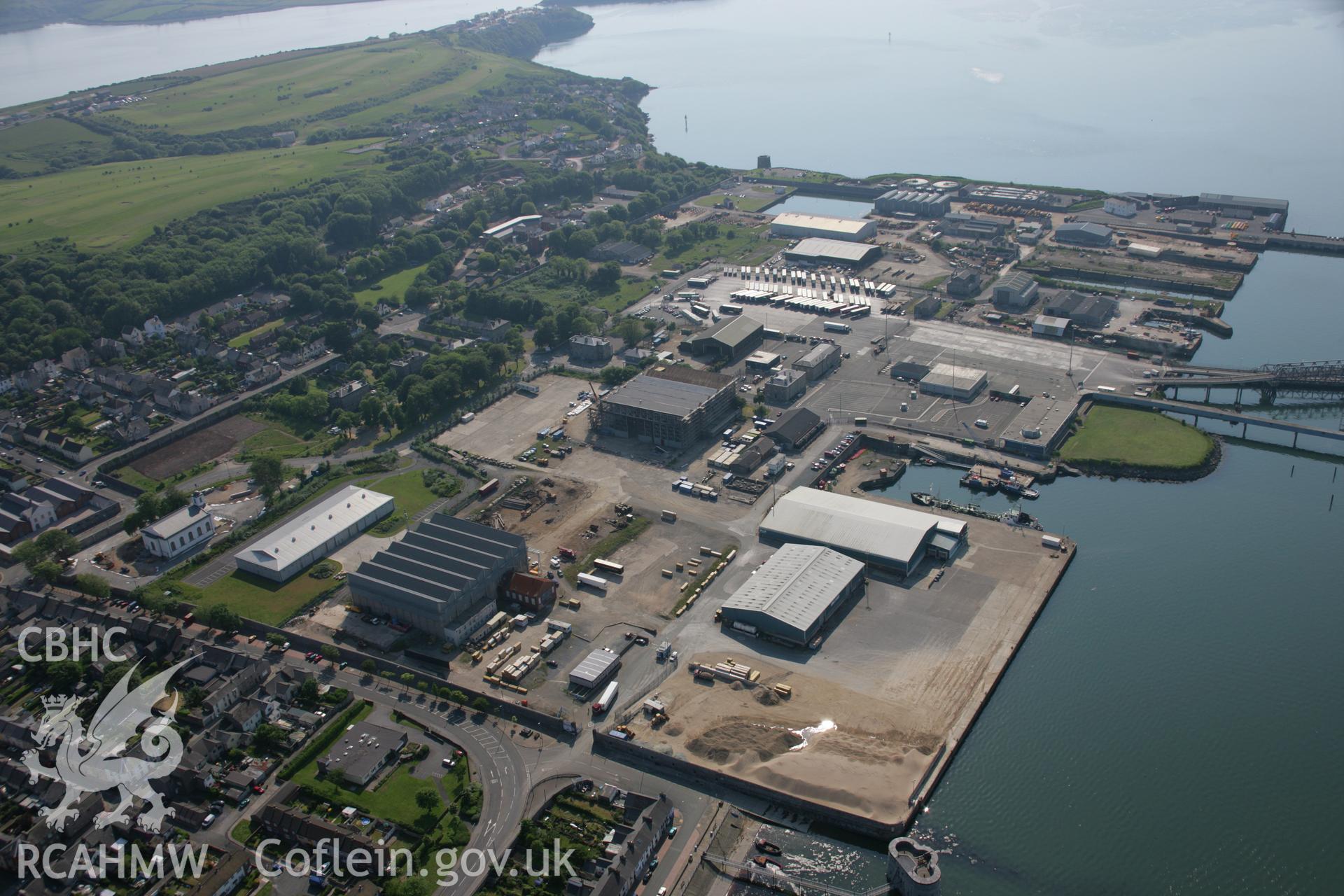 RCAHMW colour oblique aerial photograph of Pembroke Royal Dockyard, viewed from the east. Taken on 08 June 2006 by Toby Driver.