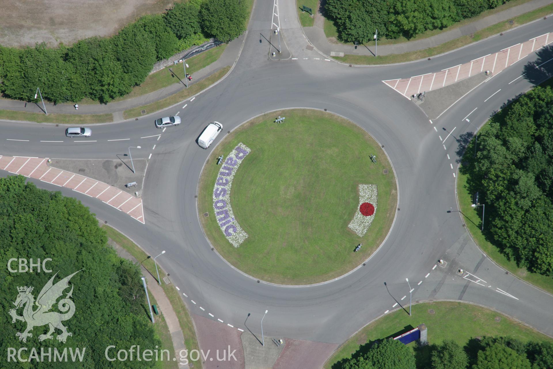 RCAHMW colour oblique photograph of Tredegar Industrial estate, roundabout at NGR. Taken by Toby Driver on 29/06/2006.