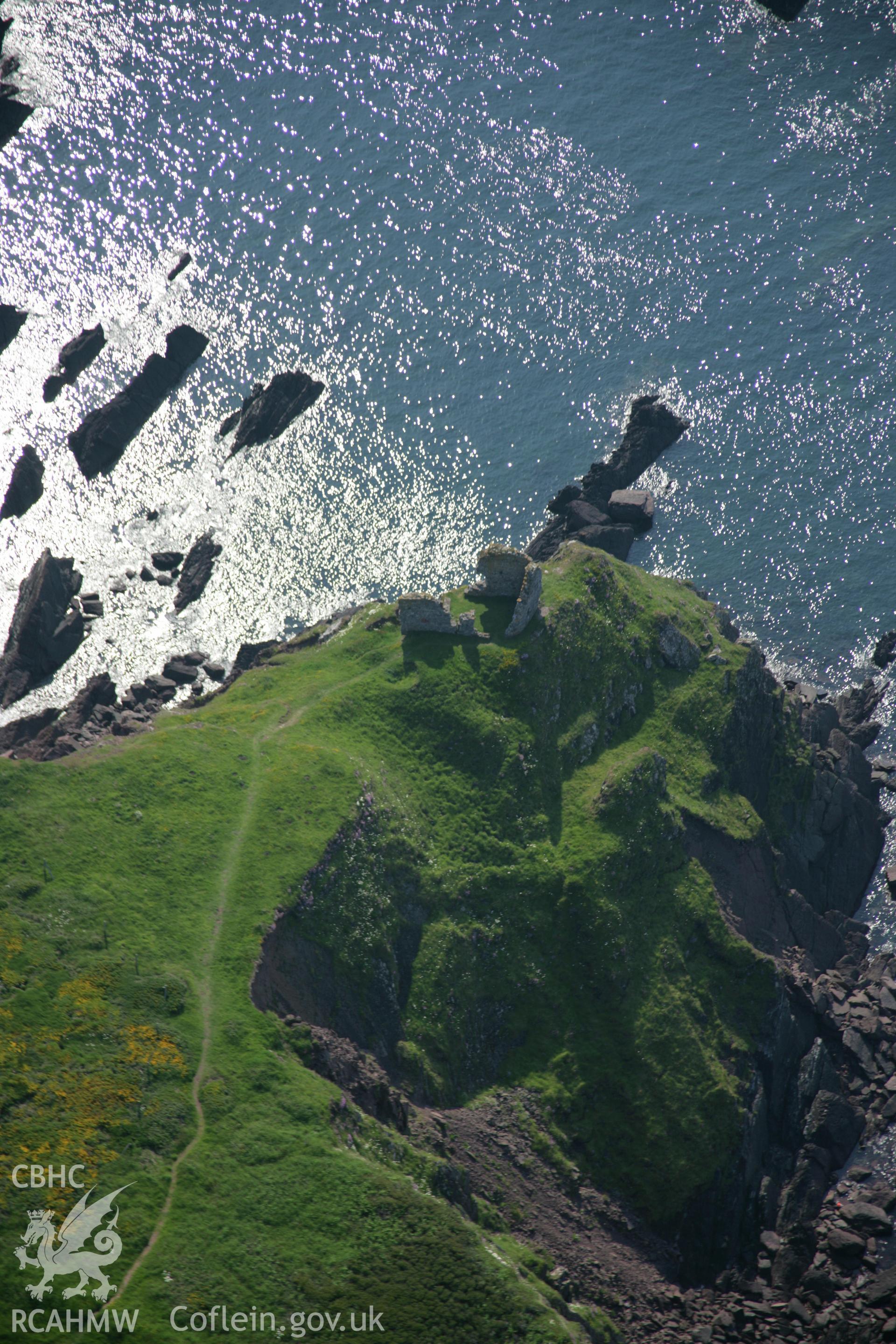 RCAHMW colour oblique aerial photograph of East Blockhouse, Angle viewed from the north. Taken on 08 June 2006 by Toby Driver.