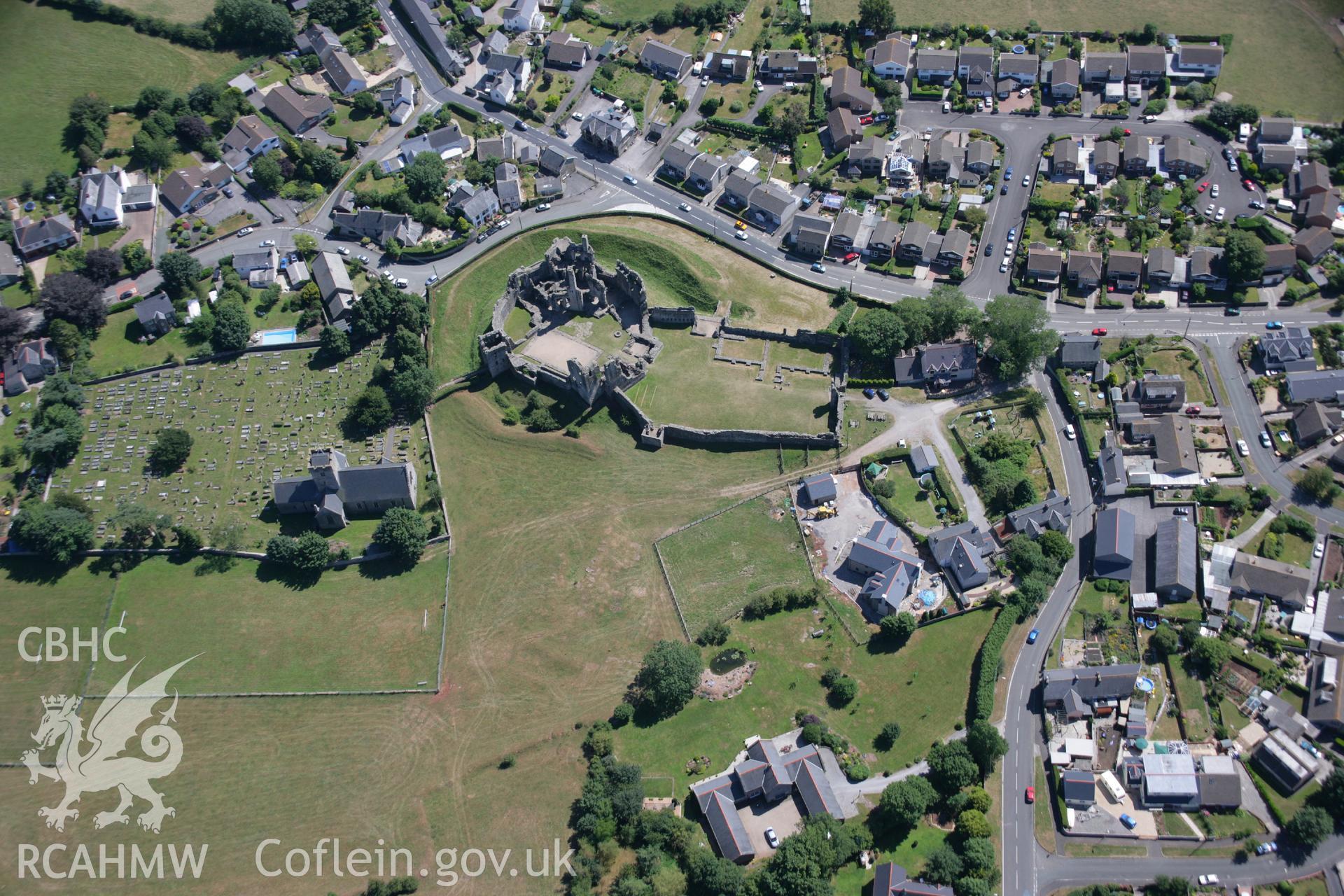 RCAHMW colour oblique aerial photograph of Coity Castle. Taken on 24 July 2006 by Toby Driver.