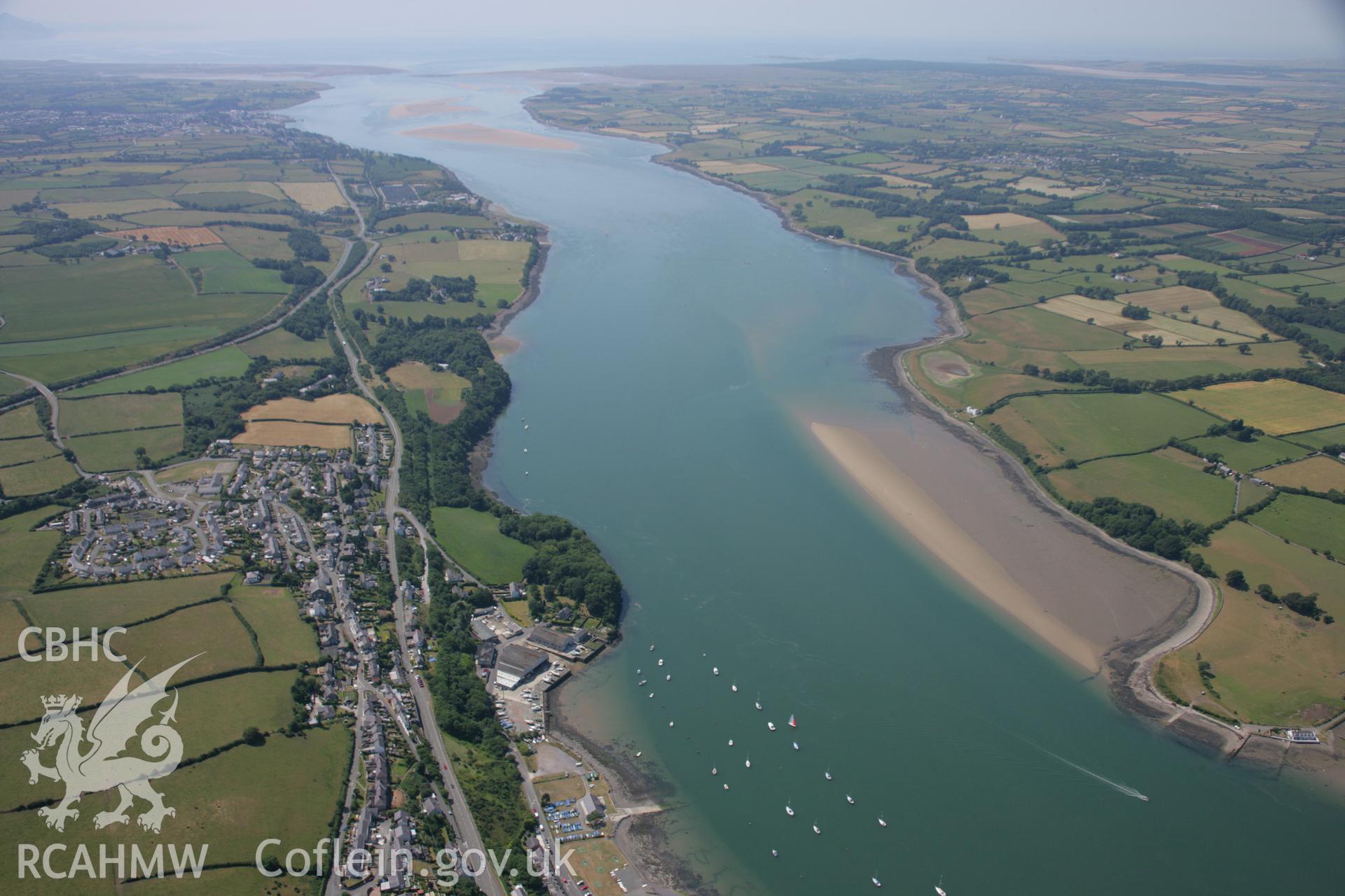 RCAHMW colour oblique aerial photograph of Dinas Camp and the Menai Strait.. Taken on 18 July 2006 by Toby Driver.