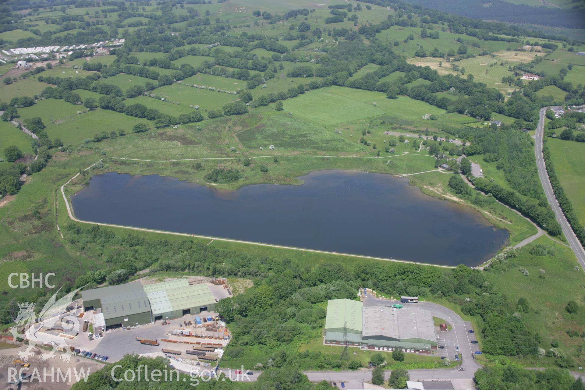 RCAHMW colour oblique aerial photograph of Pen y Fan Canal Reservoir,viewed from the south-west.. Taken on 09 June 2006 by Toby Driver.