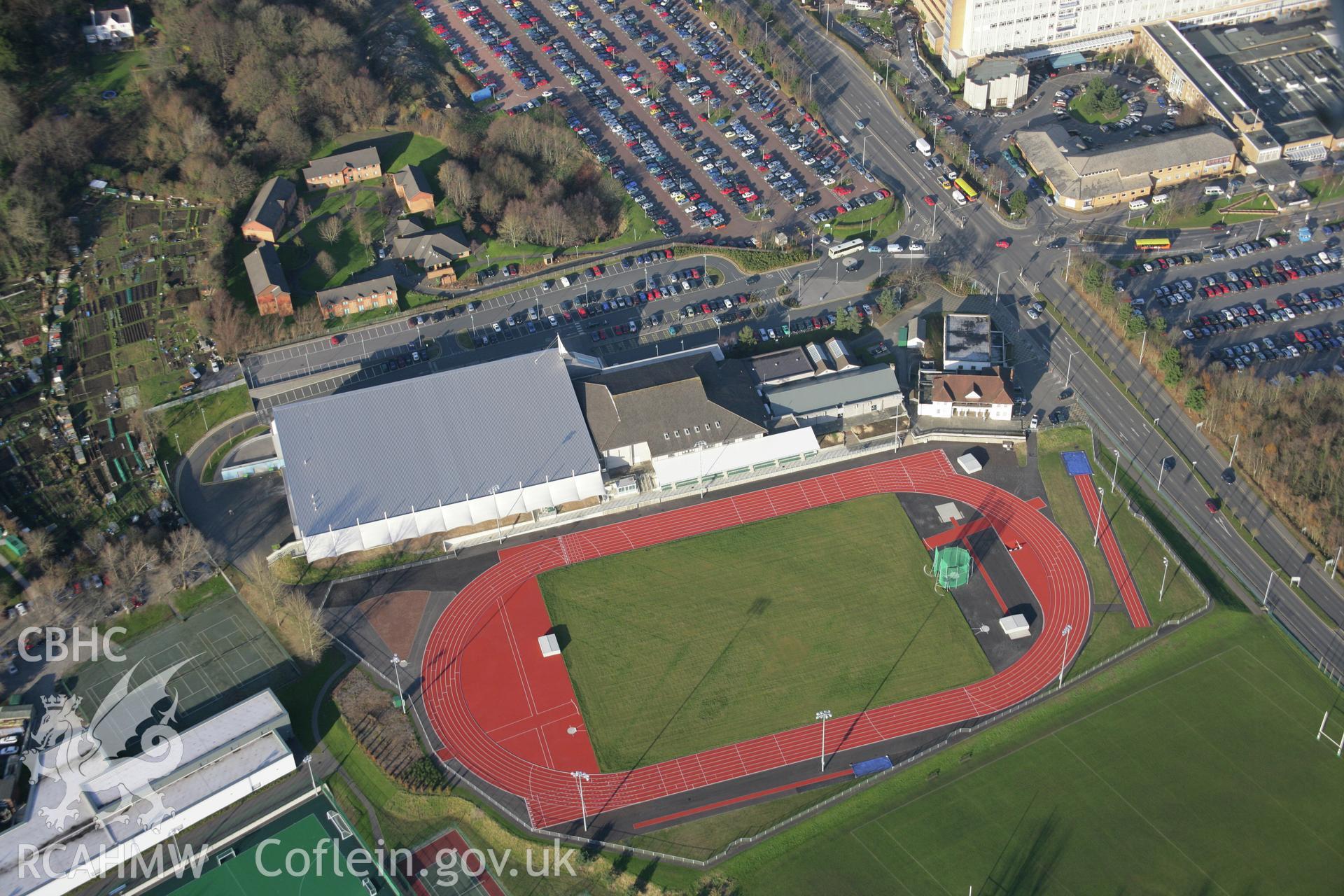 RCAHMW colour oblique aerial photograph of University College, Swansea, showing the sports field from the south-east. Taken on 26 January 2006 by Toby Driver.
