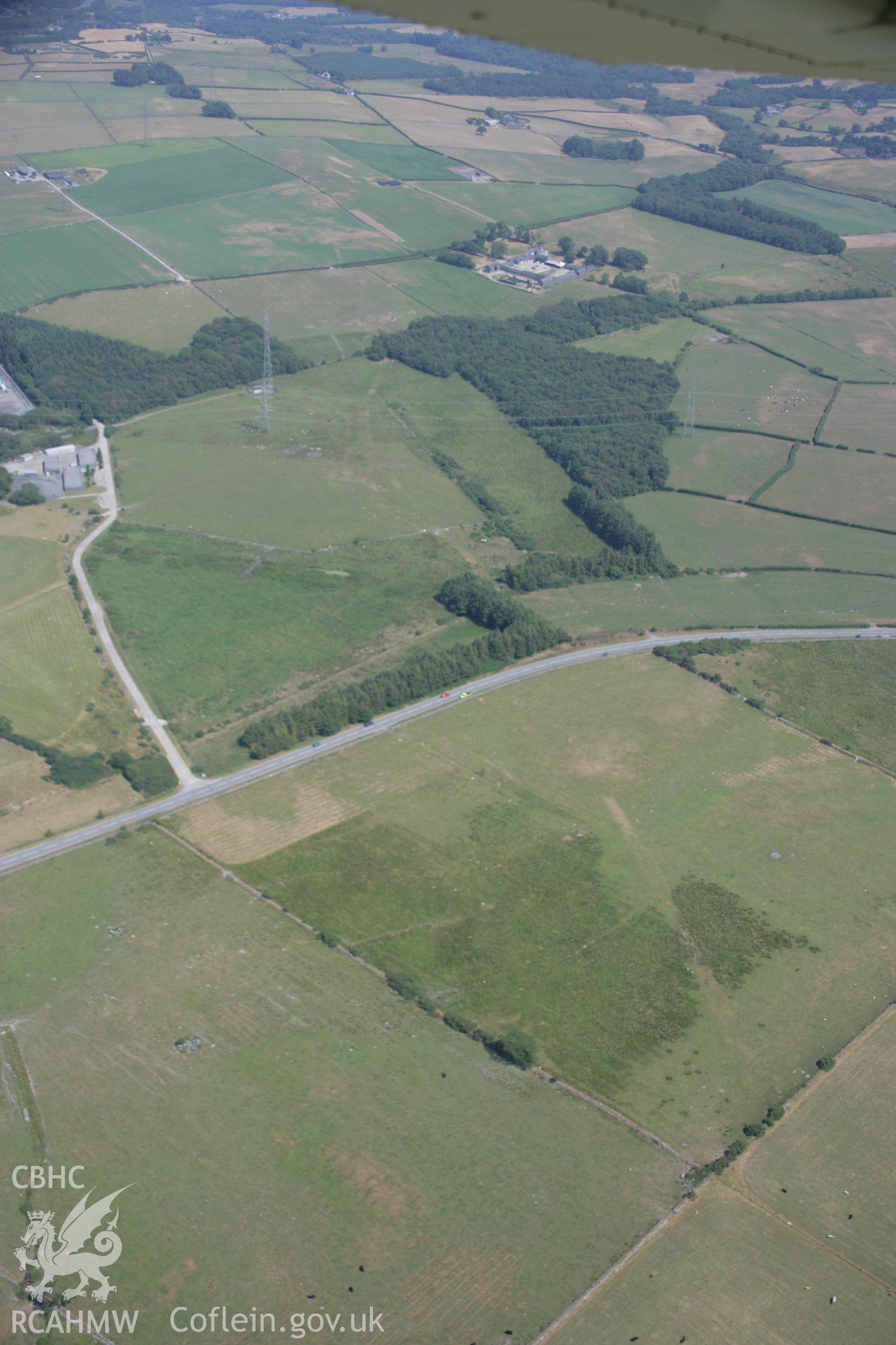 RCAHMW colour oblique aerial photograph of Roman road parchmarks Taken on 25 July 2006 by Toby Driver.