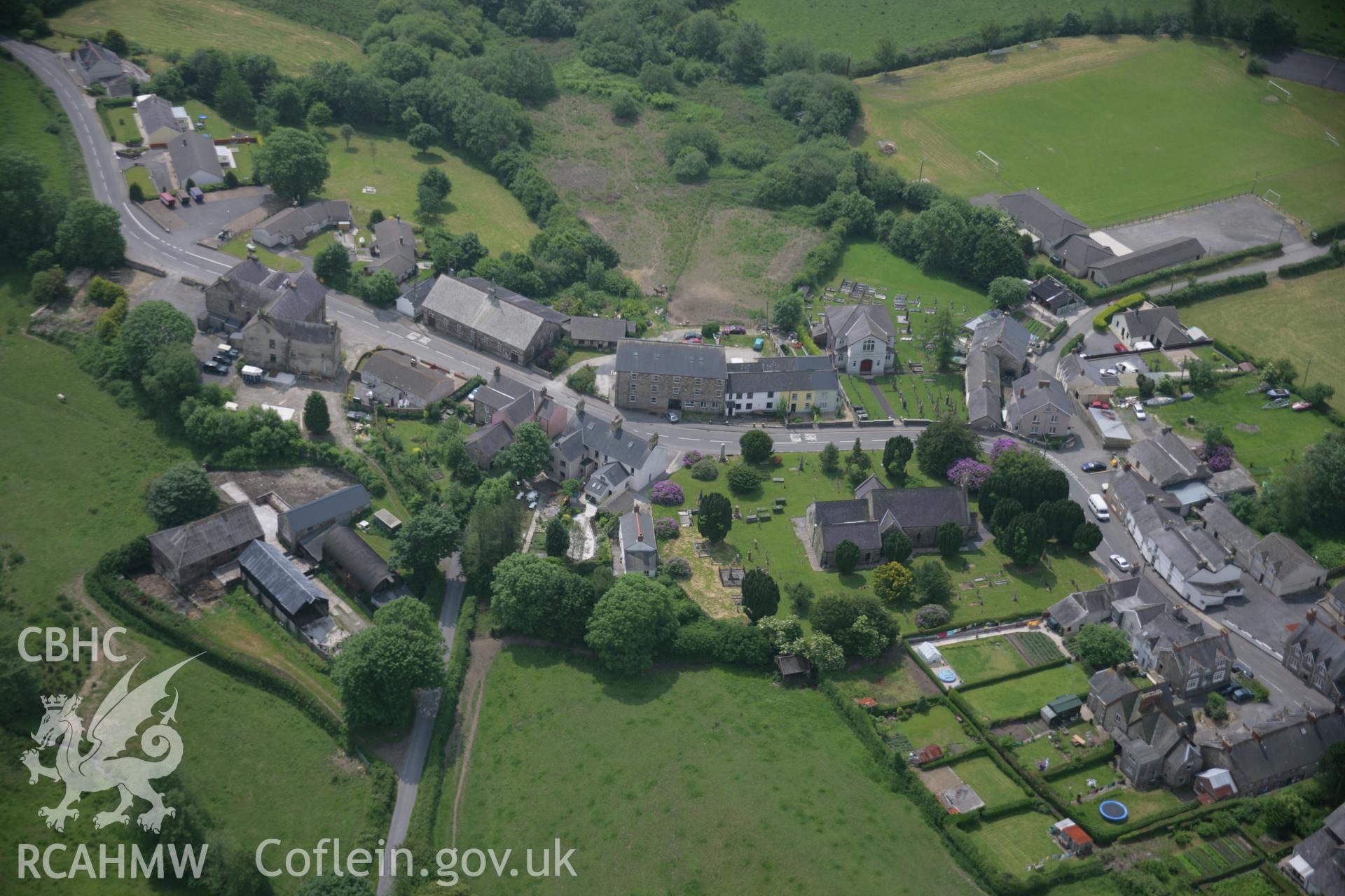 RCAHMW colour oblique aerial photograph of St Brynach's, Llanboidy Village, viewed from the north. Taken on 15 June 2006 by Toby Driver.