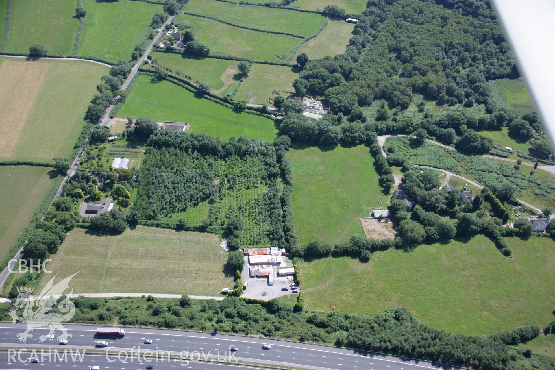 RCAHMW colour oblique aerial photograph of Pant-y-Pyllau Earthwork. Taken on 24 July 2006 by Toby Driver.