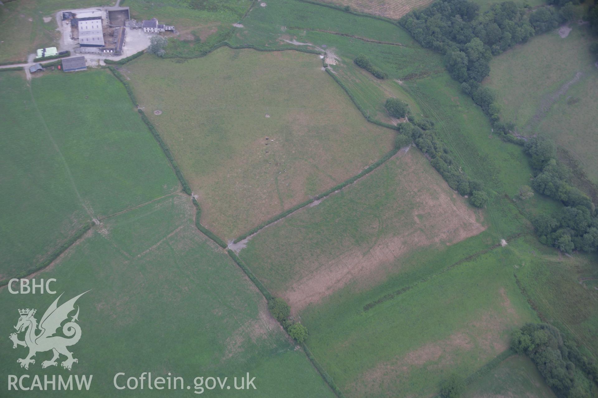 RCAHMW colour oblique aerial photograph of a cropmark enclosure south of Blaen-Lliwe. Taken on 21 July 2006 by Toby Driver.