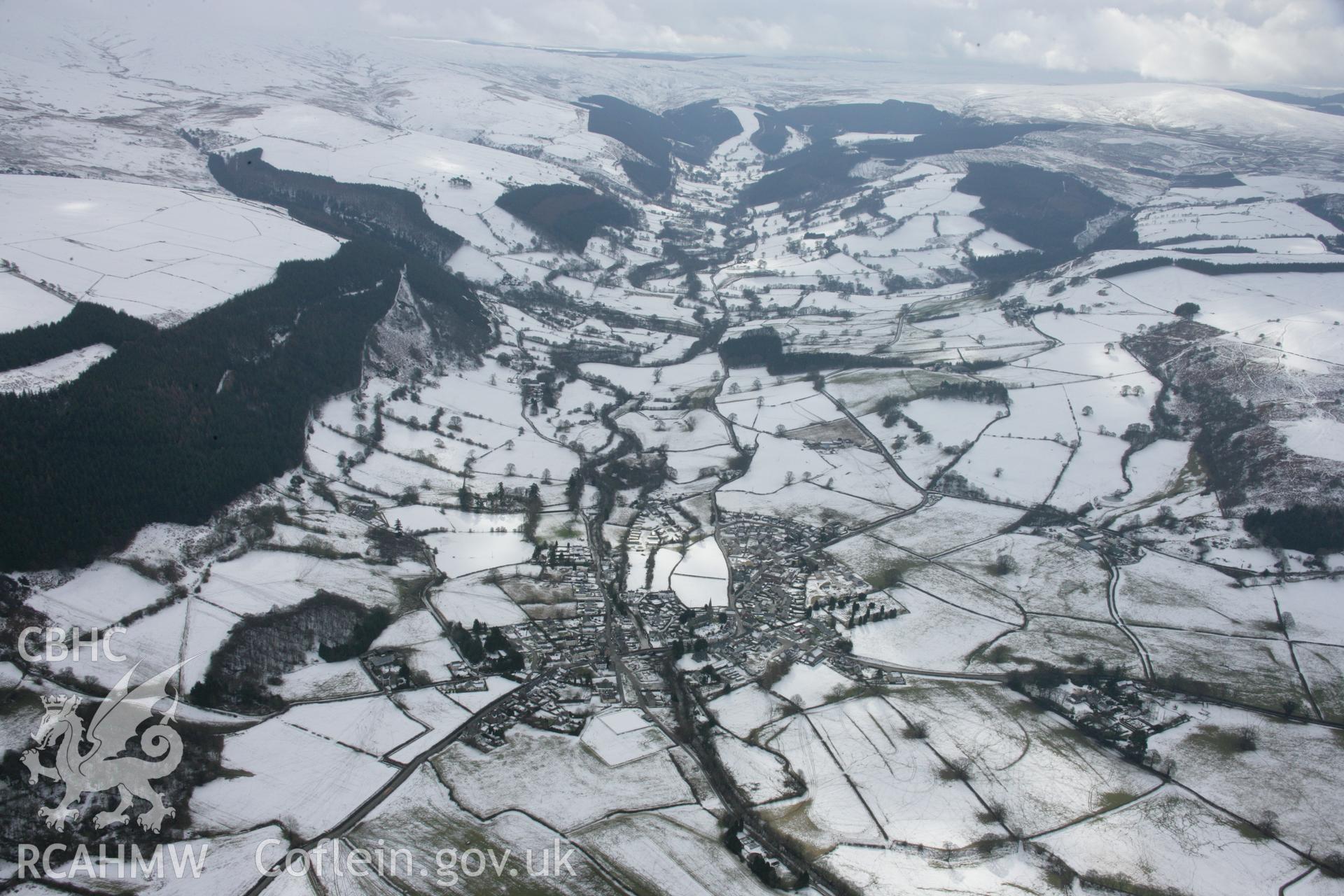 RCAHMW colour oblique aerial photograph of Llandrillo viewed from the north with snow. Taken on 06 March 2006 by Toby Driver.