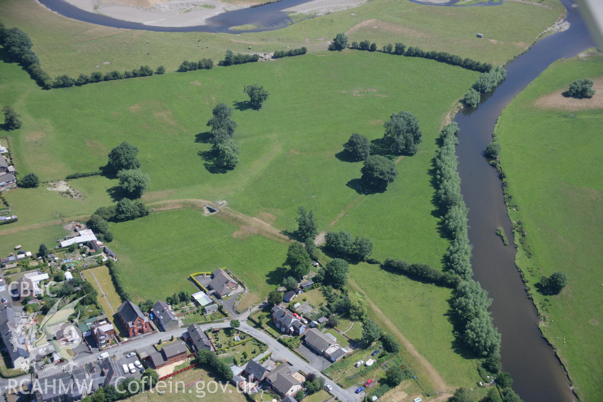 RCAHMW colour oblique aerial photograph of Caersws Roman Military Settlement. Taken on 17 July 2006 by Toby Driver.