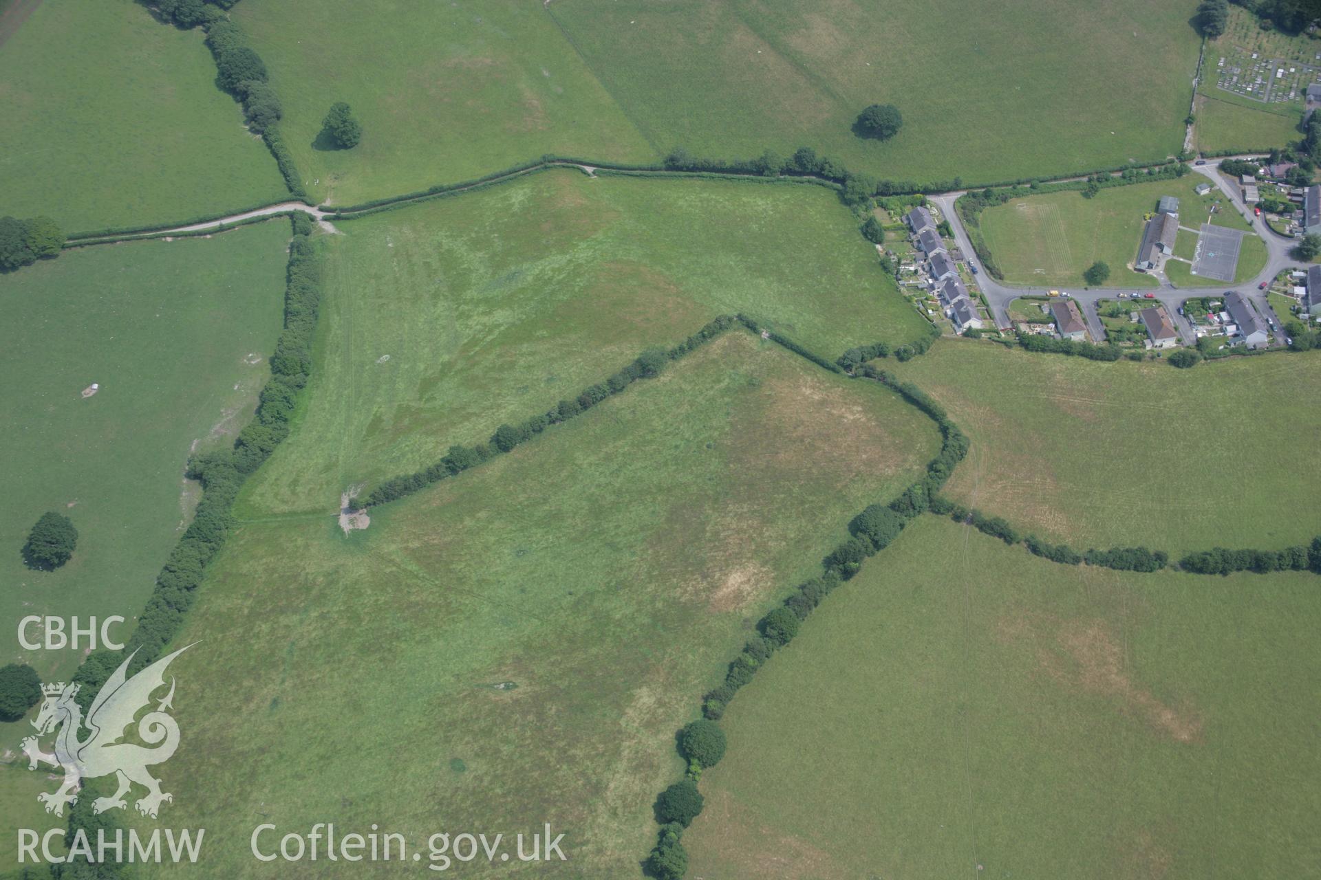 RCAHMW colour oblique aerial photograph of Pen-Llwyn Roman Fort. Taken on 04 July 2006 by Toby Driver.