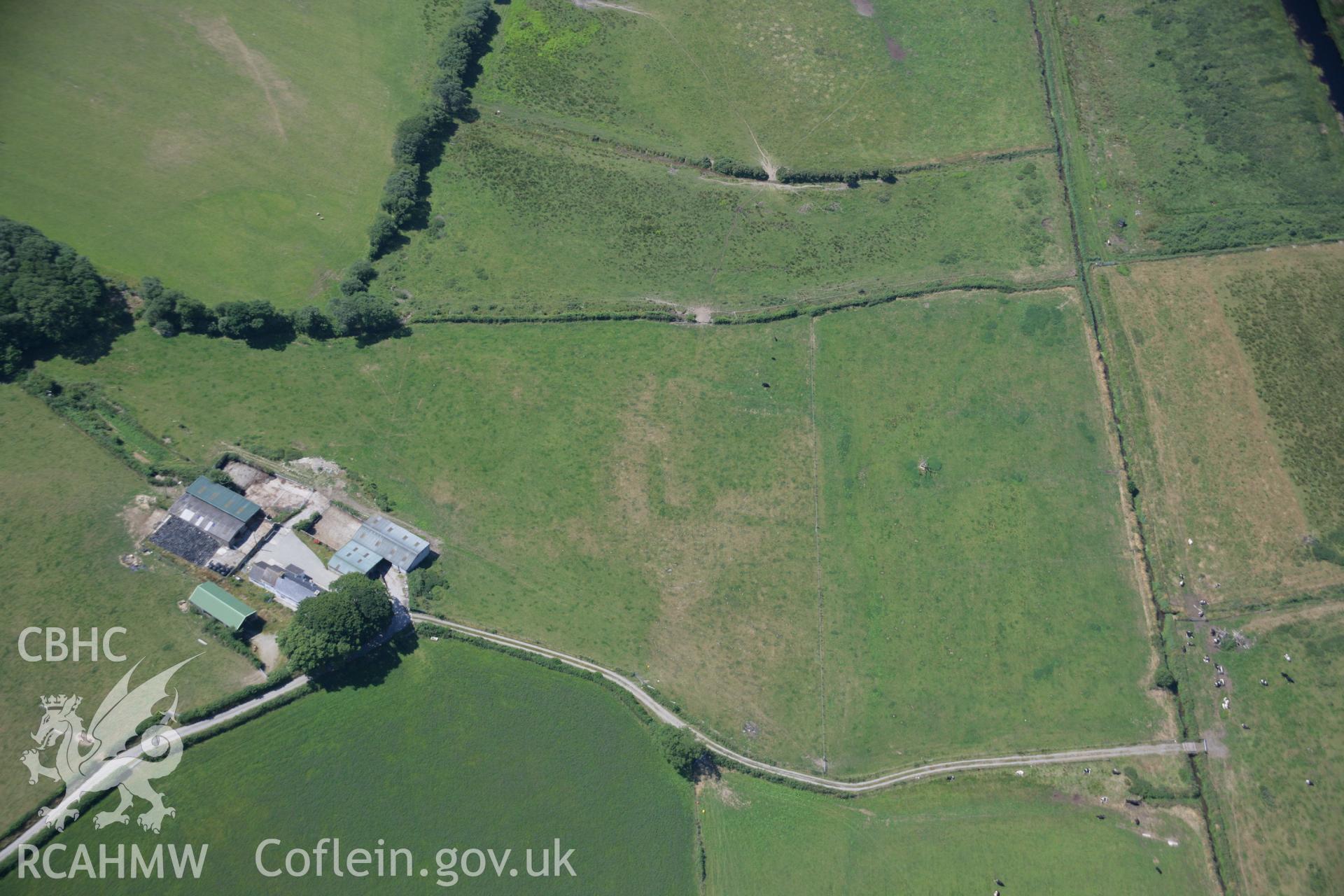 RCAHMW colour oblique aerial photograph of Ynyscapel Enclosure. Taken on 17 July 2006 by Toby Driver.