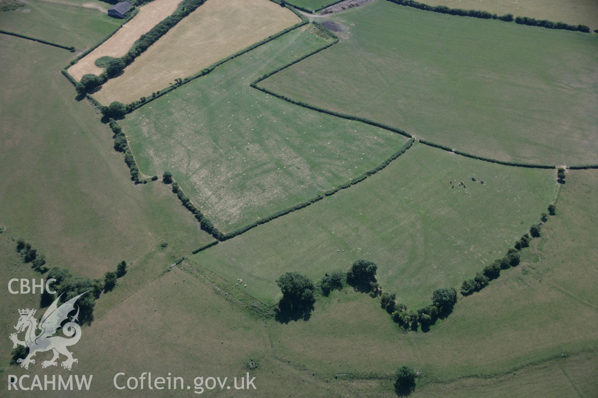 RCAHMW colour oblique aerial photograph of the causewayed enclosure at Flemingston. Taken on 24 July 2006 by Toby Driver.