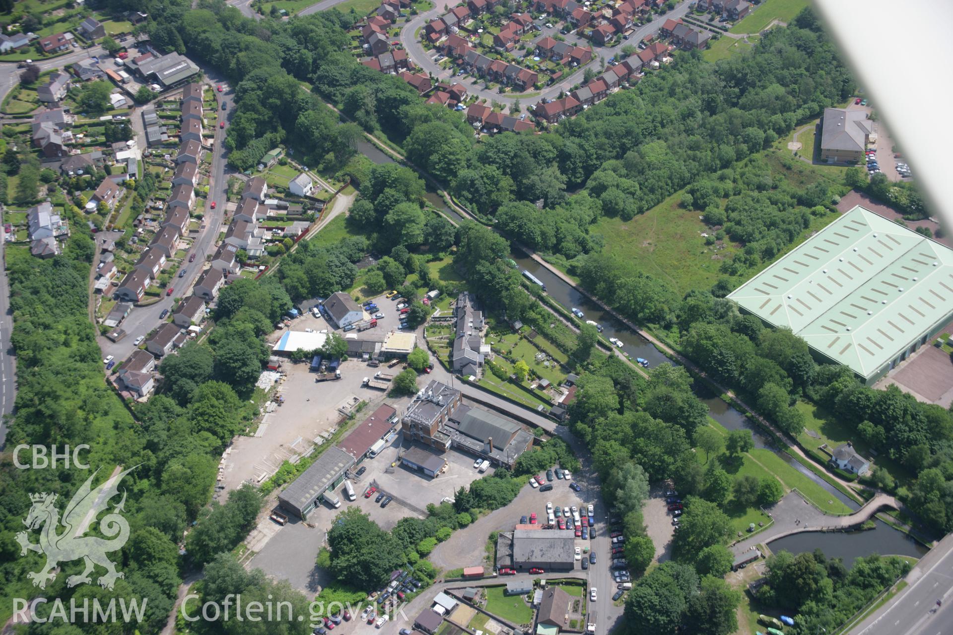 RCAHMW colour oblique aerial photograph of Monmouthshire Canal, Pantymoile, viewed from the west. Taken on 09 June 2006 by Toby Driver.