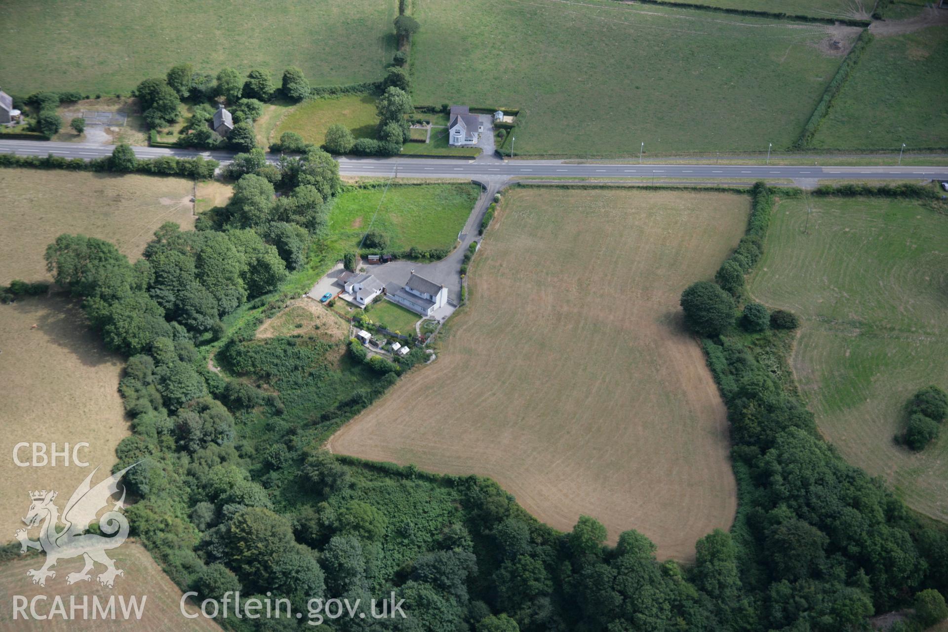 RCAHMW colour oblique aerial photograph of Blaenporth Castle. Taken on 27 July 2006 by Toby Driver.