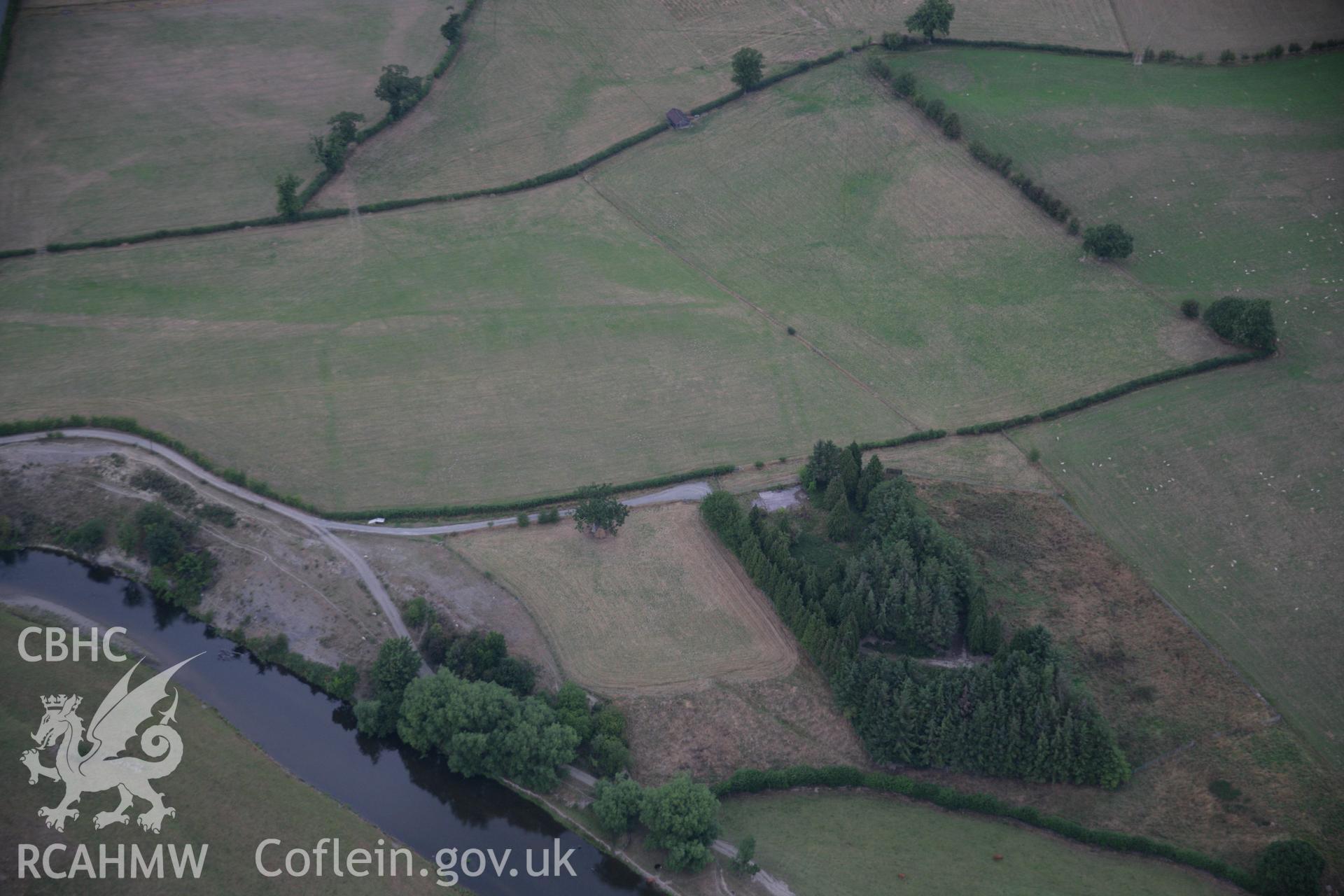 RCAHMW colour oblique aerial photograph showing parchmarks in grass at Llwyn-y-Brain Roman Fort. Taken on 14 August 2006 by Toby Driver.