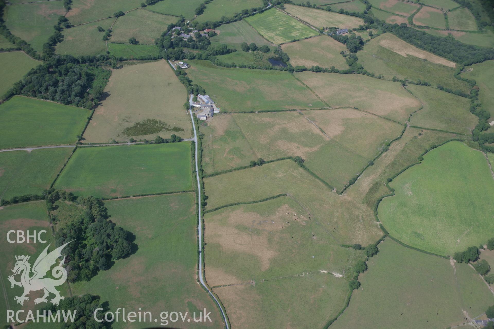 RCAHMW colour oblique aerial photograph of Penarth Fawr ring ditch.. Taken on 25 July 2006 by Toby Driver.