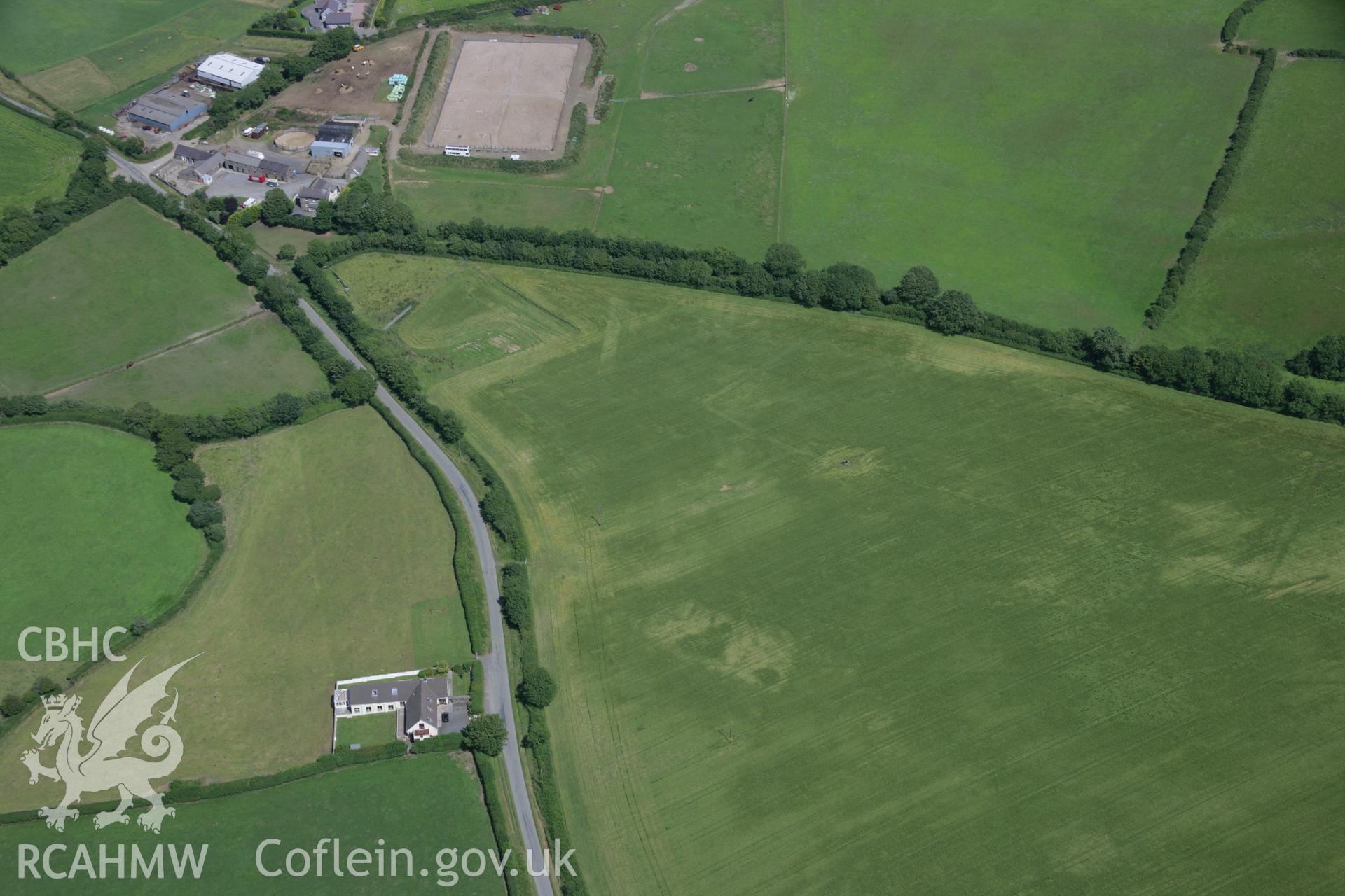 RCAHMW colour oblique aerial photograph of the Roman road west of Carmarthen at Broadway with the road showing as a cropmark. Taken on 11 July 2006 by Toby Driver.