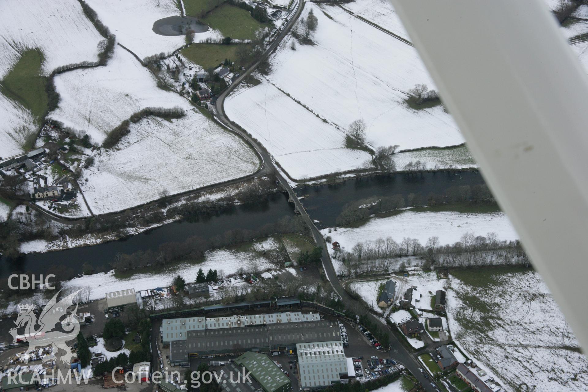 RCAHMW colour oblique aerial photograph of Cynwyd Bridge, Pont Dyfrdwy, viewed from the east. Taken on 06 March 2006 by Toby Driver