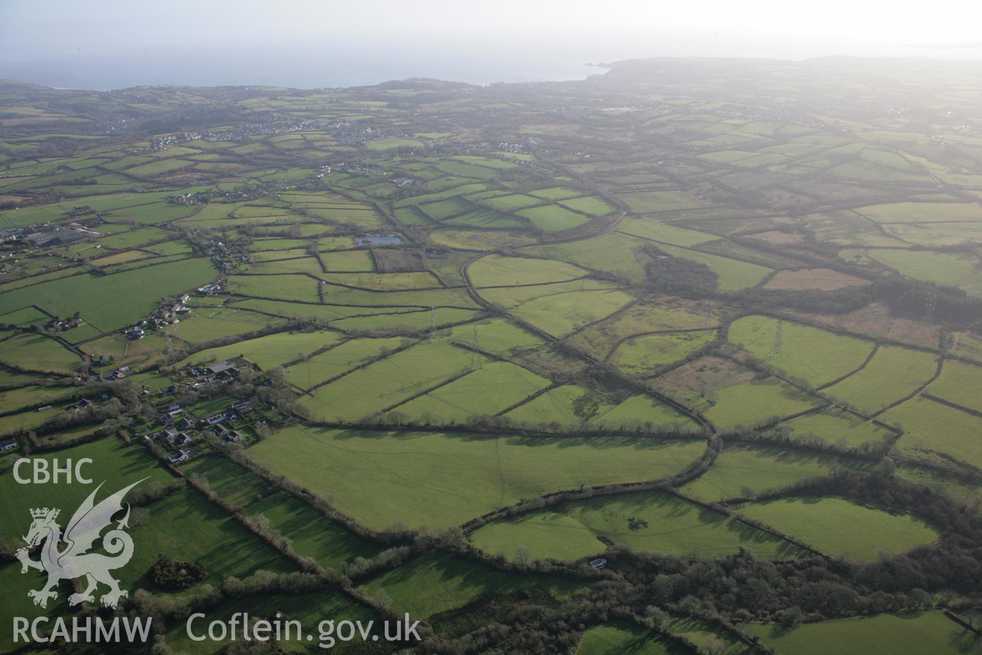 RCAHMW colour oblique aerial photograph of the Thomas Chapel to Begelly section of the Saundersfoot Railway. A view looking south-east over Begelly. Taken on 11 January 2006 by Toby Driver.