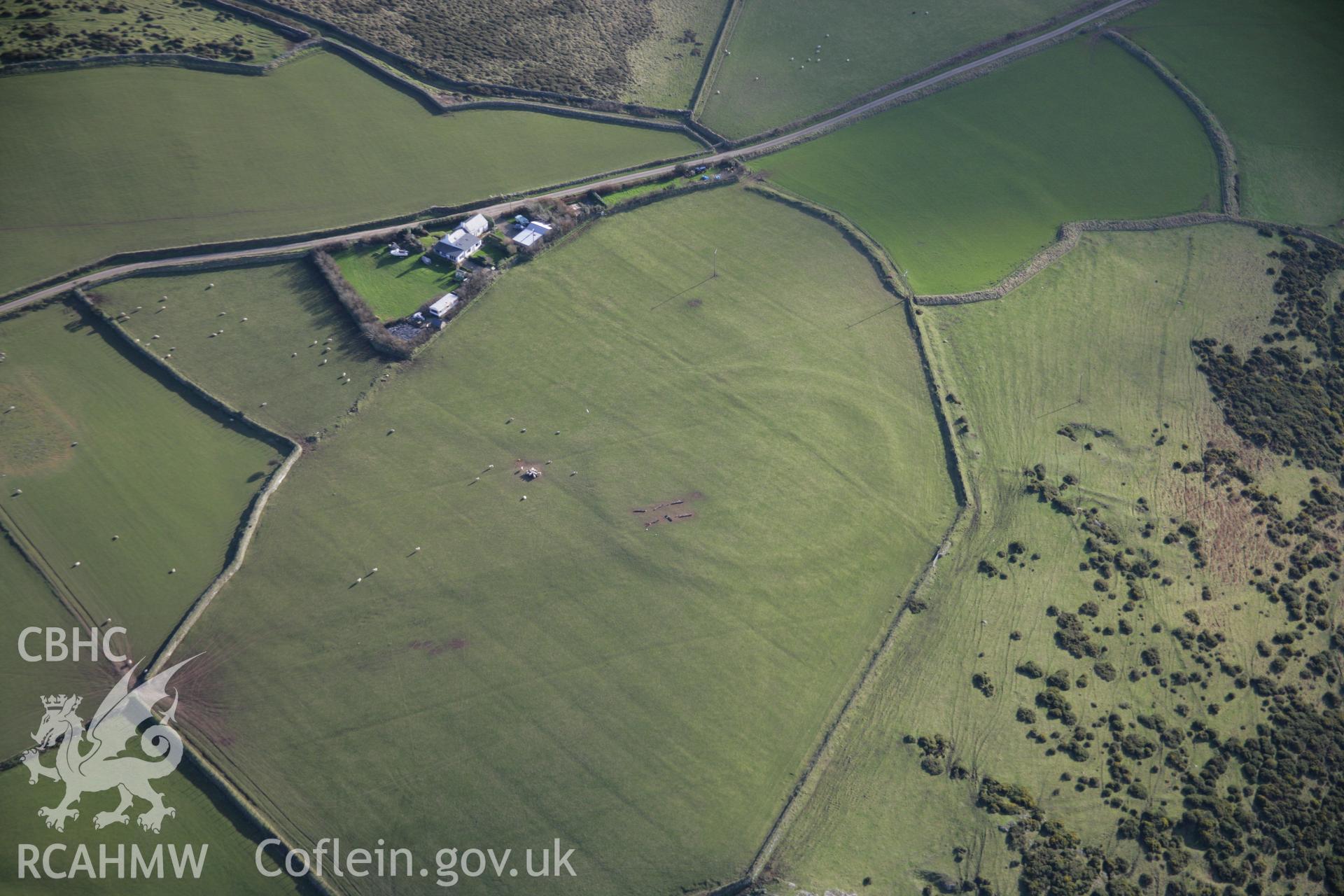 RCAHMW colour oblique aerial photograph of Meillionydd Defended Enclosure, viewed from the west. Taken on 09 February 2006 by Toby Driver.