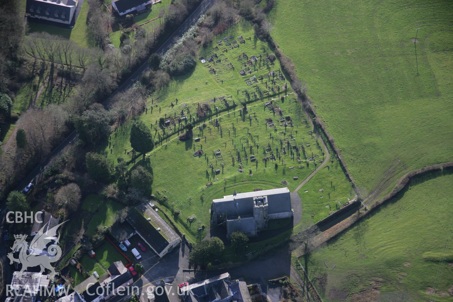 RCAHMW colour oblique aerial photograph of St Andrew's Church from the north. Taken on 11 January 2006 by Toby Driver.