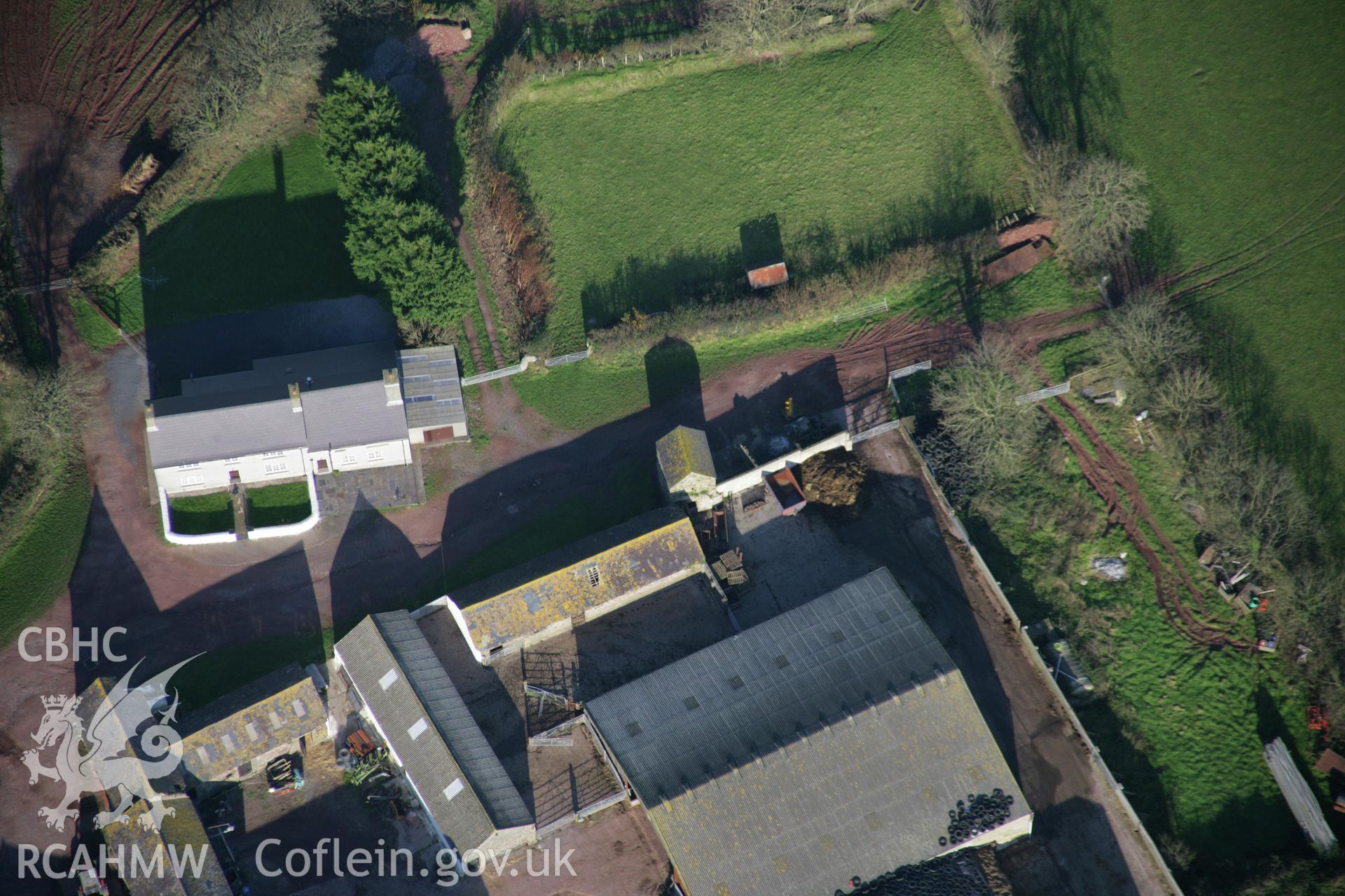 RCAHMW colour oblique aerial photograph of Kingston Farm Medieval Outbuilding, Pembroke, viewed from the south. Taken on 19 November 2005 by Toby Driver