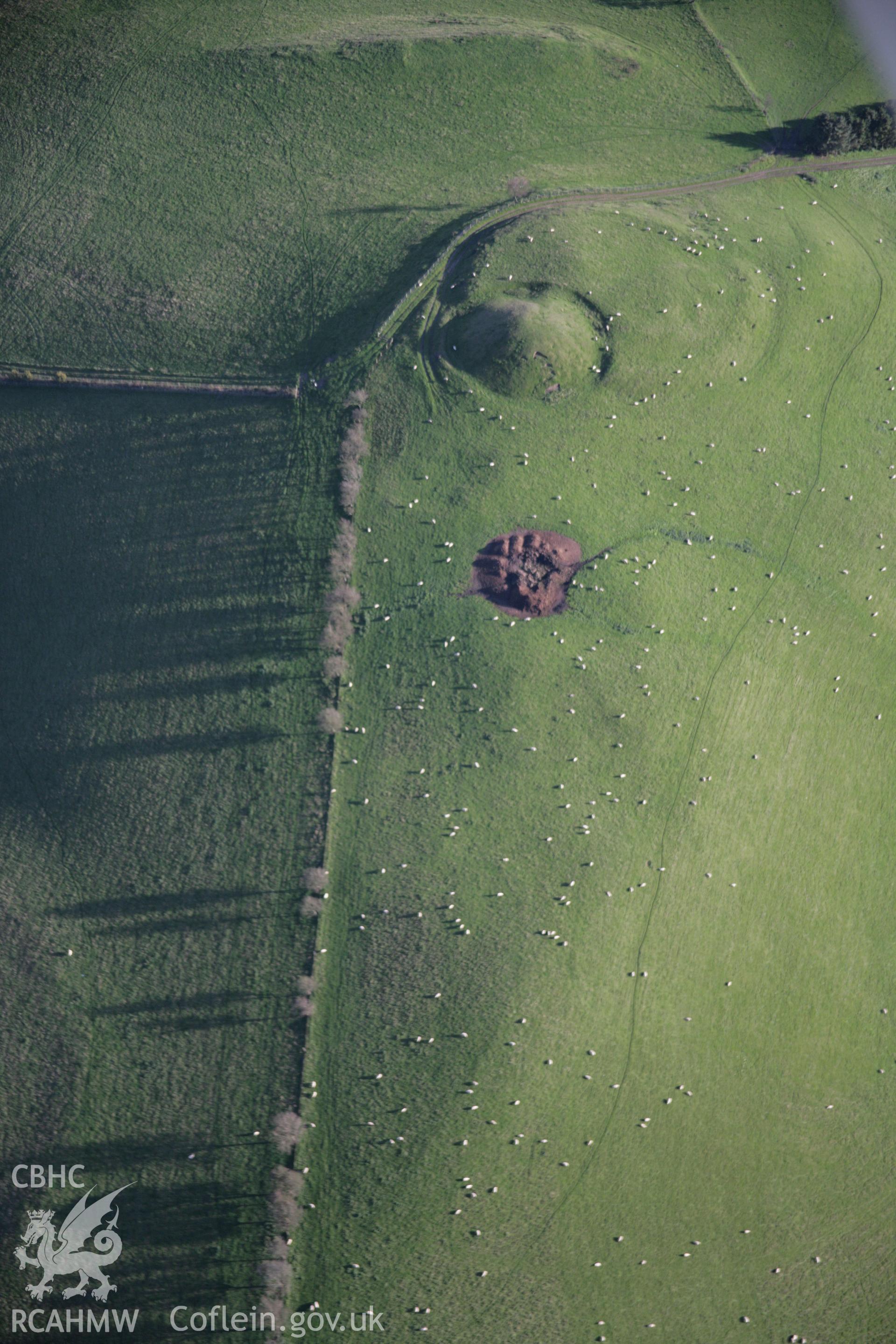 RCAHMW colour oblique aerial photograph of Tomen Bedd-Ugre from the north-west. Taken on 13 October 2005 by Toby Driver