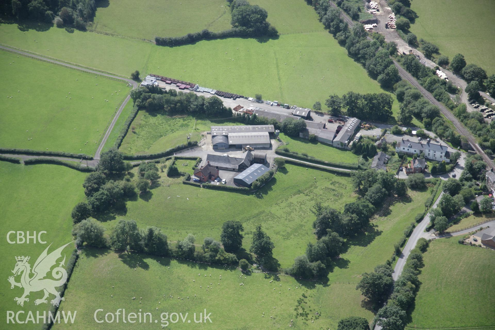 RCAHMW colour oblique aerial photograph of Cwrt Llechryd from the north-east. Taken on 02 September 2005 by Toby Driver