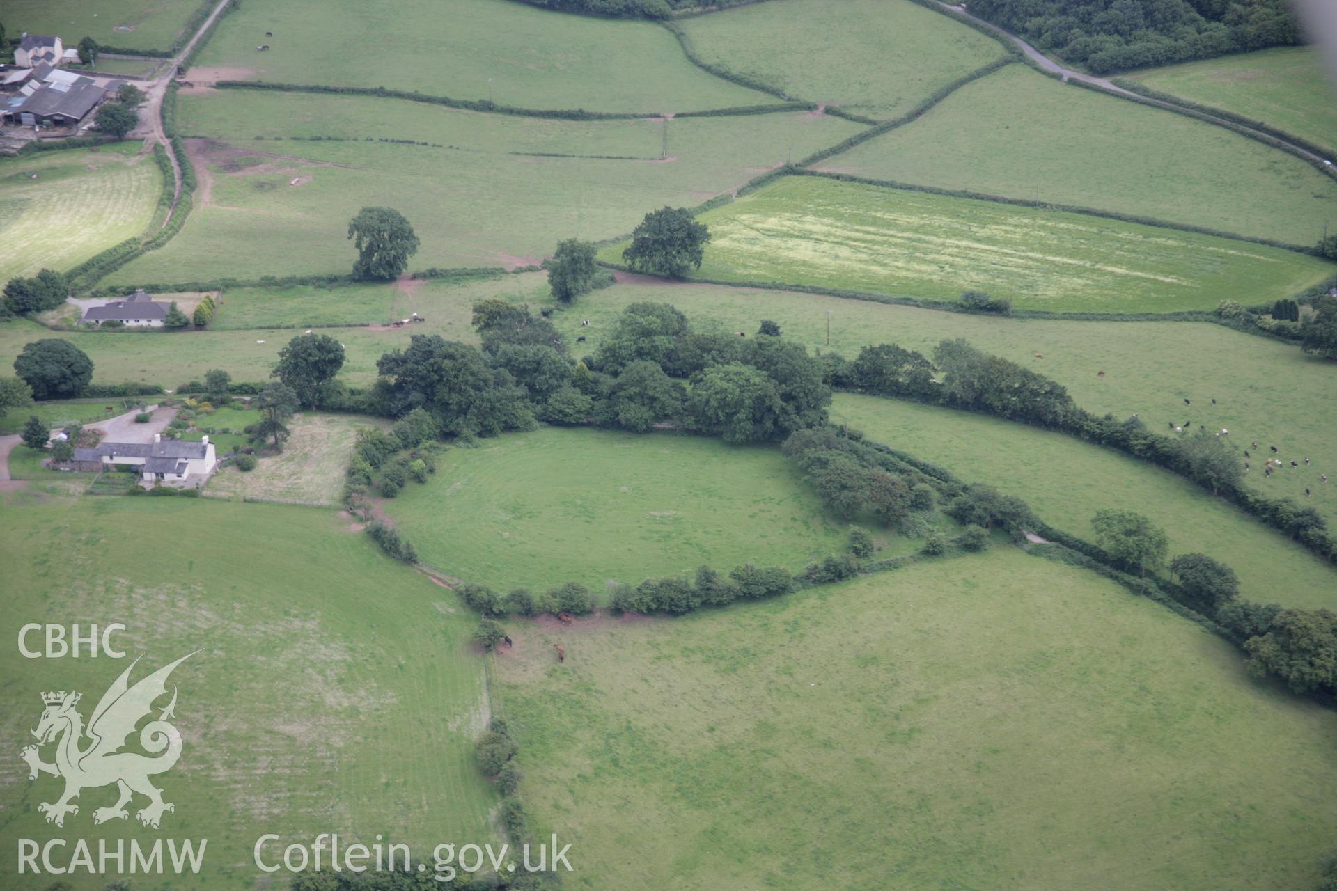 RCAHMW digital colour oblique photograph of Llwynfa Ddu Hillfort viewed from the north-west. Taken on 07/07/2005 by T.G. Driver.