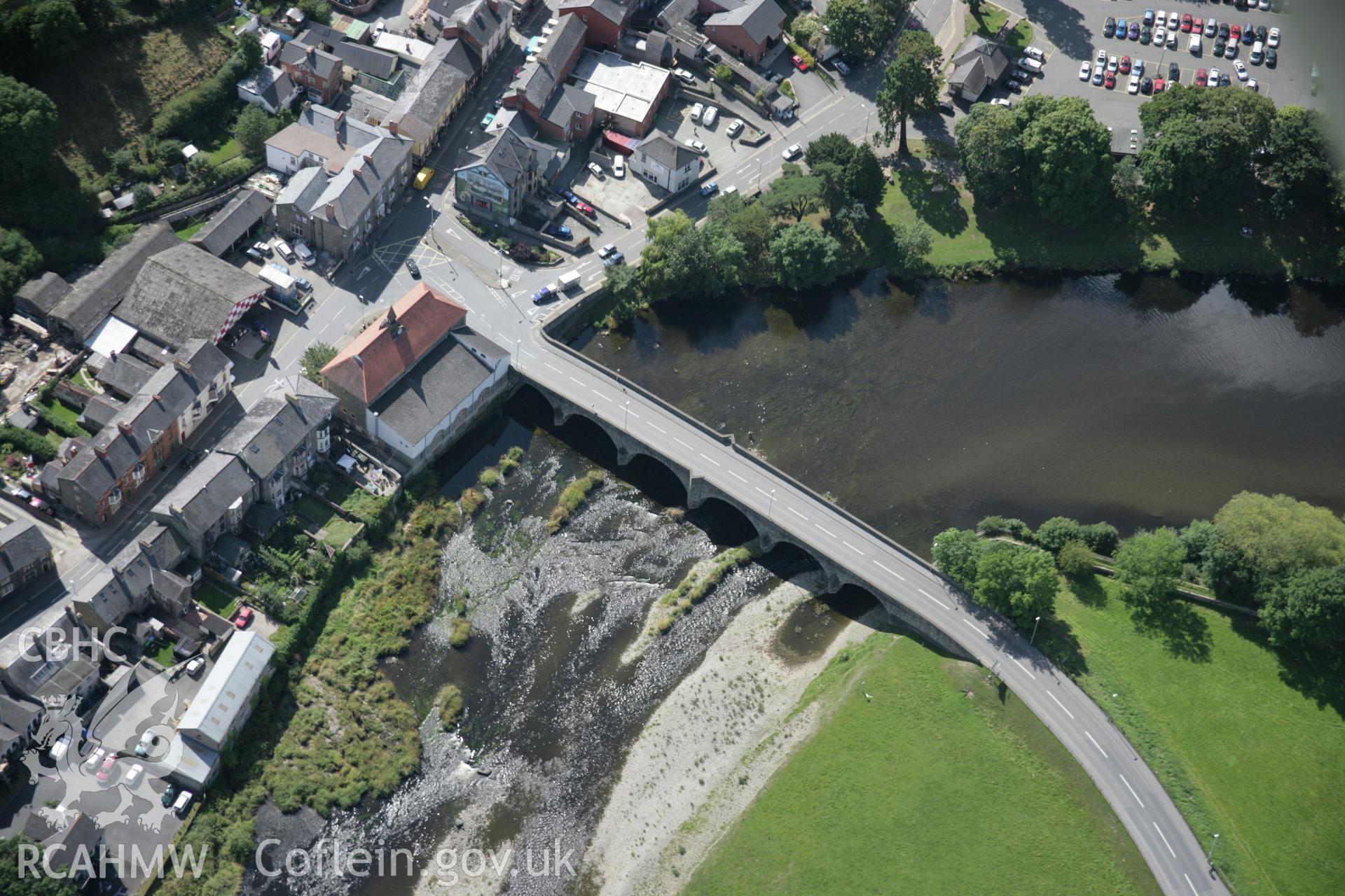 RCAHMW colour oblique aerial photograph of Builth Bridge the north-east. Taken on 02 September 2005 by Toby Driver