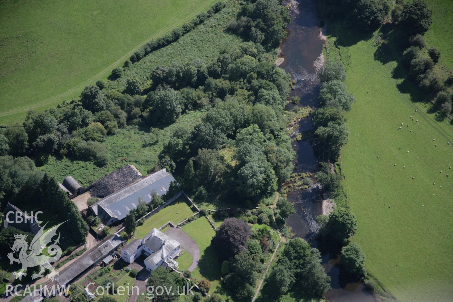 RCAHMW colour oblique aerial photograph of Aberyscir Castle from the north-west. Taken on 02 September 2005 by Toby Driver