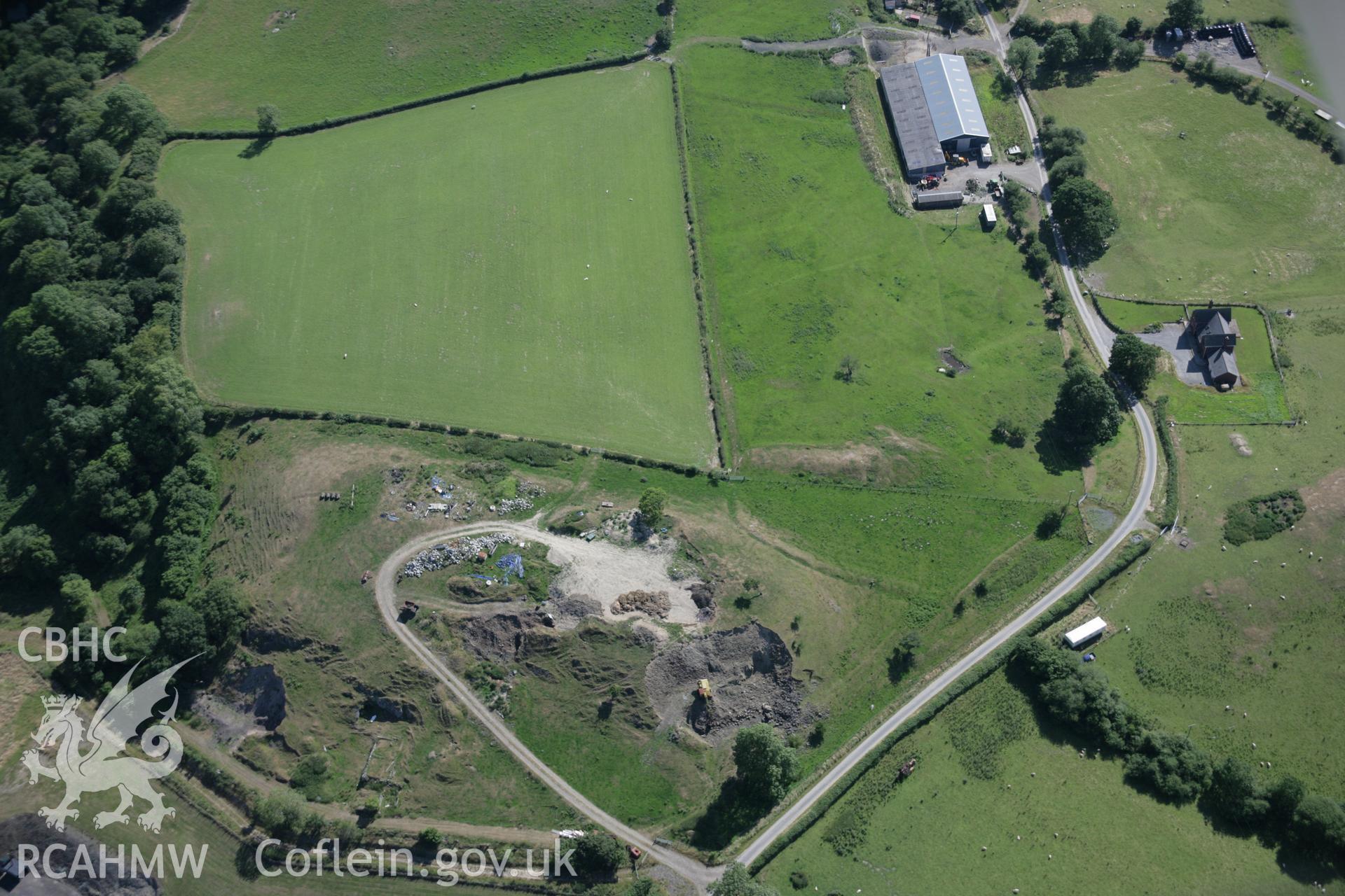 RCAHMW digital colour oblique photograph of Neuadd Farm viewed from the east. Taken on 21/07/2005 by T.G. Driver.