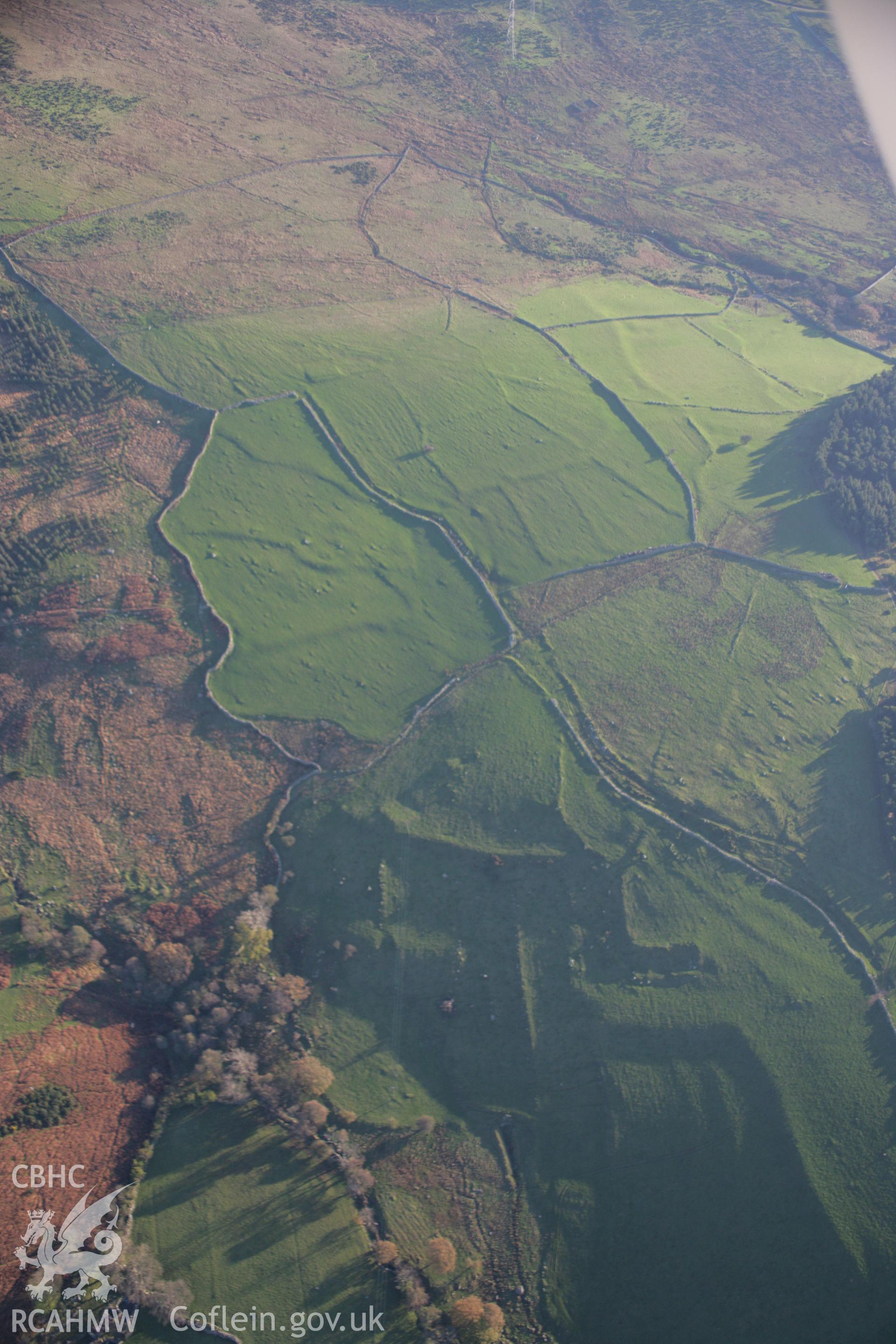 RCAHMW colour oblique aerial photograph of Cae'r Haidd Terraced Field System and deserted settlements looking north-west. Taken on 21 November 2005 by Toby Driver