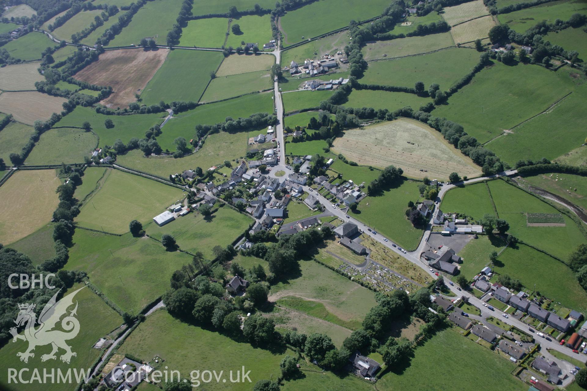 RCAHMW colour oblique aerial photograph of Llangeitho village in high view from the east. Taken on 23 June 2005 by Toby Driver