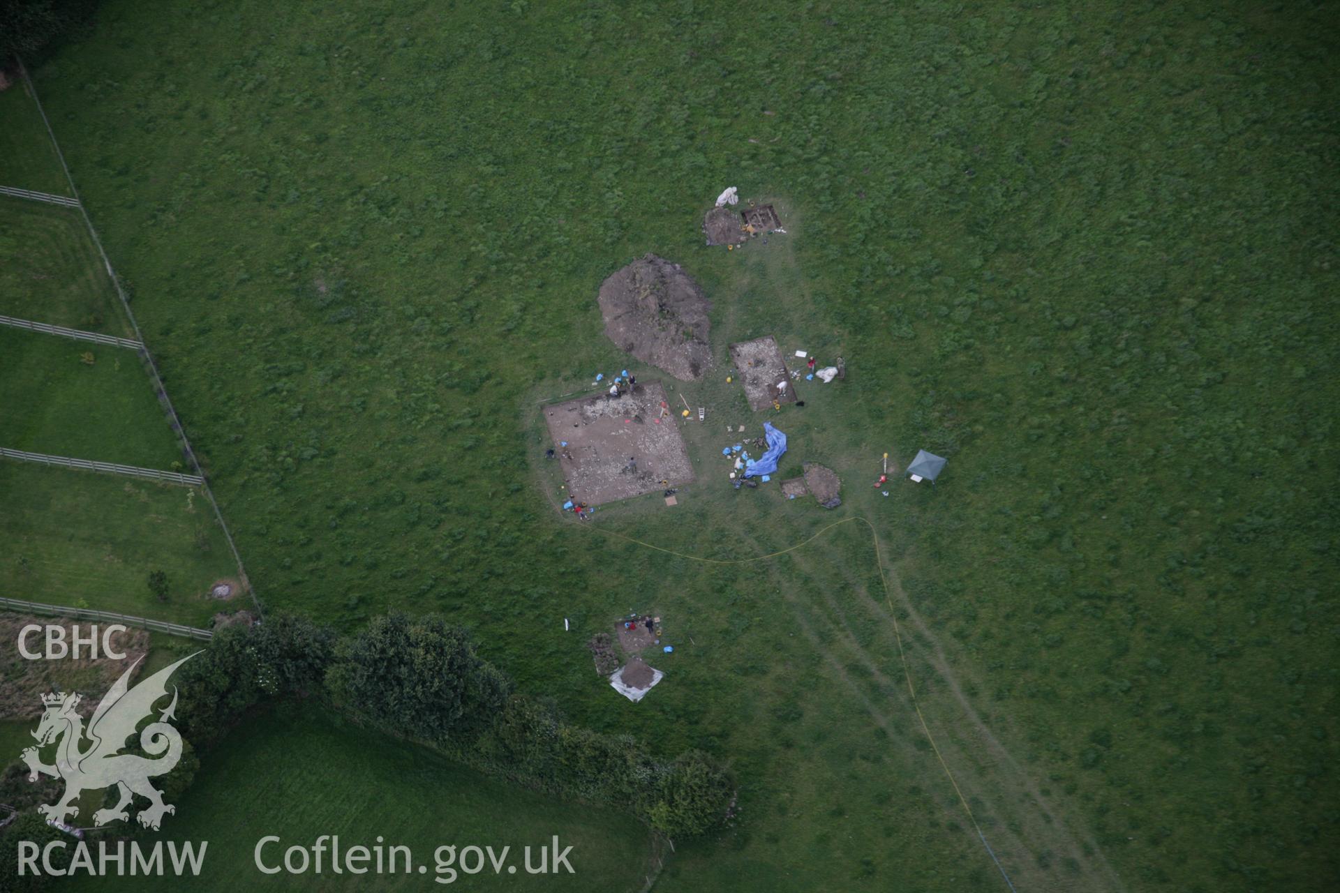 RCAHMW digital colour oblique photograph of excavations by the National Museum of Wales at the Llanmaes Prehistoric Settlement and hoard site. Taken on 07/07/2005 by T.G. Driver.