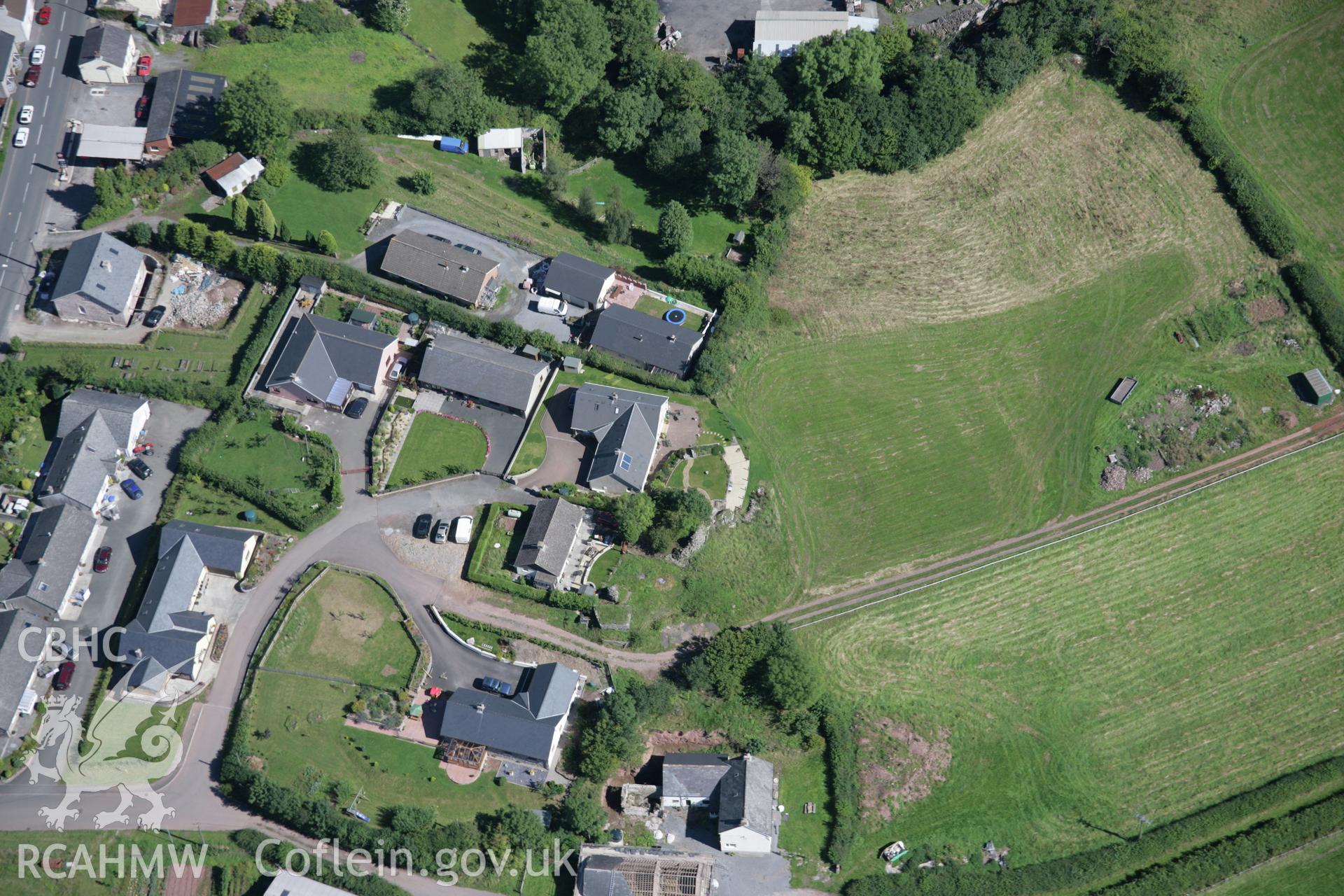 RCAHMW colour oblique aerial photograph of Sennybridge Castle, from the south-west. Taken on 02 September 2005 by Toby Driver