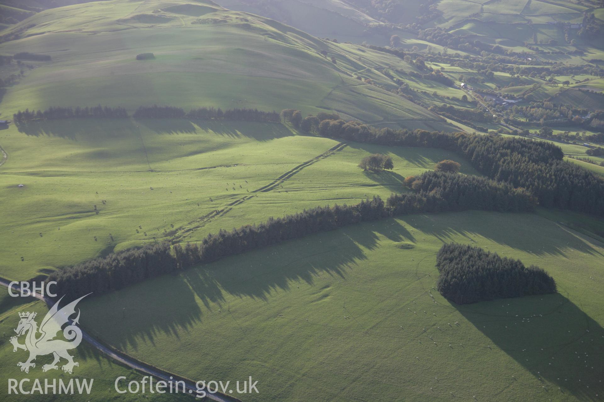 RCAHMW colour oblique aerial photograph of Crugyn Bank Dyke from the north-east. Taken on 13 October 2005 by Toby Driver