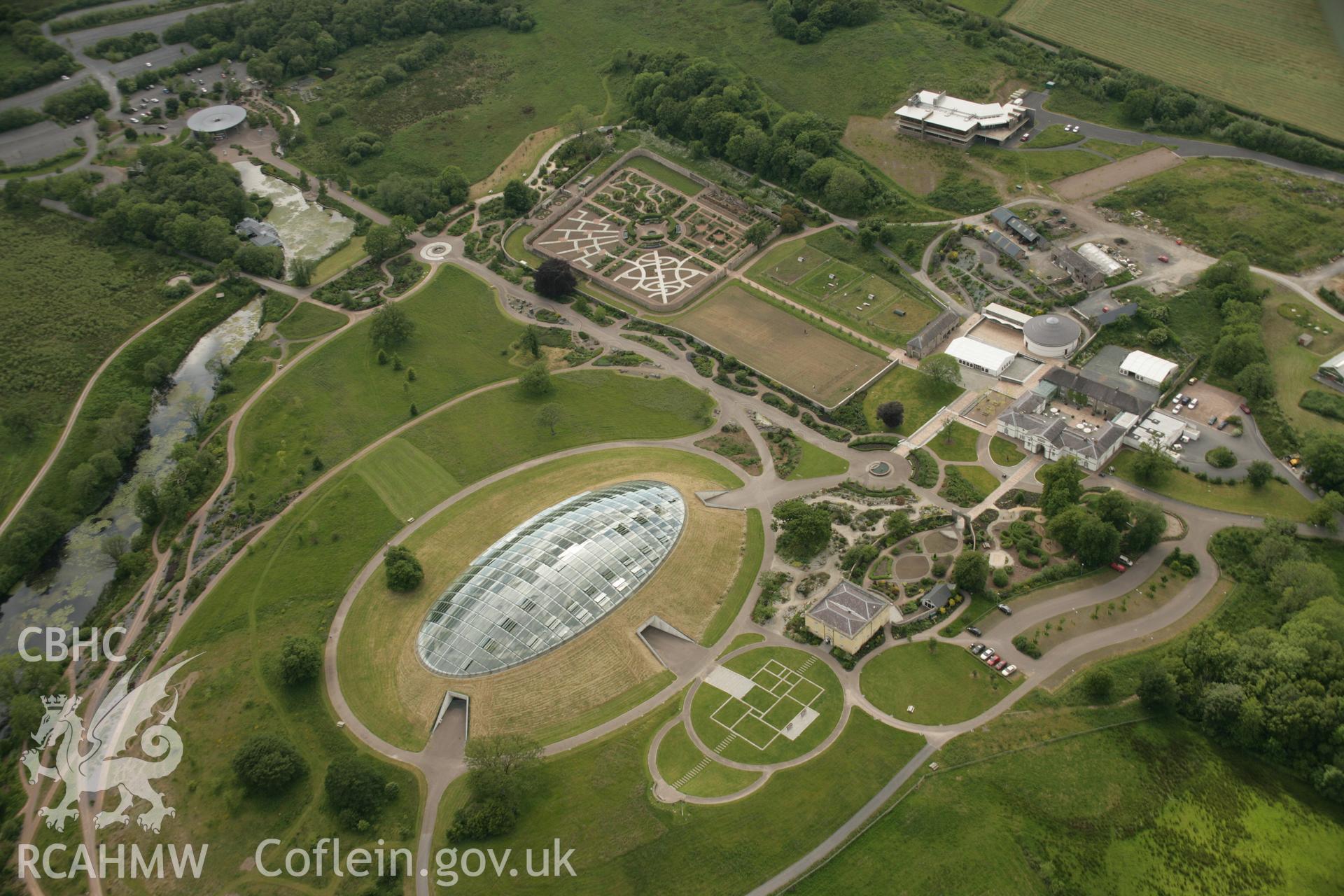 RCAHMW colour oblique aerial photograph of Middleton Hall Park, now the National Botanic Garden of Wales, in general view from the east. Taken on 09 June 2005 by Toby Driver